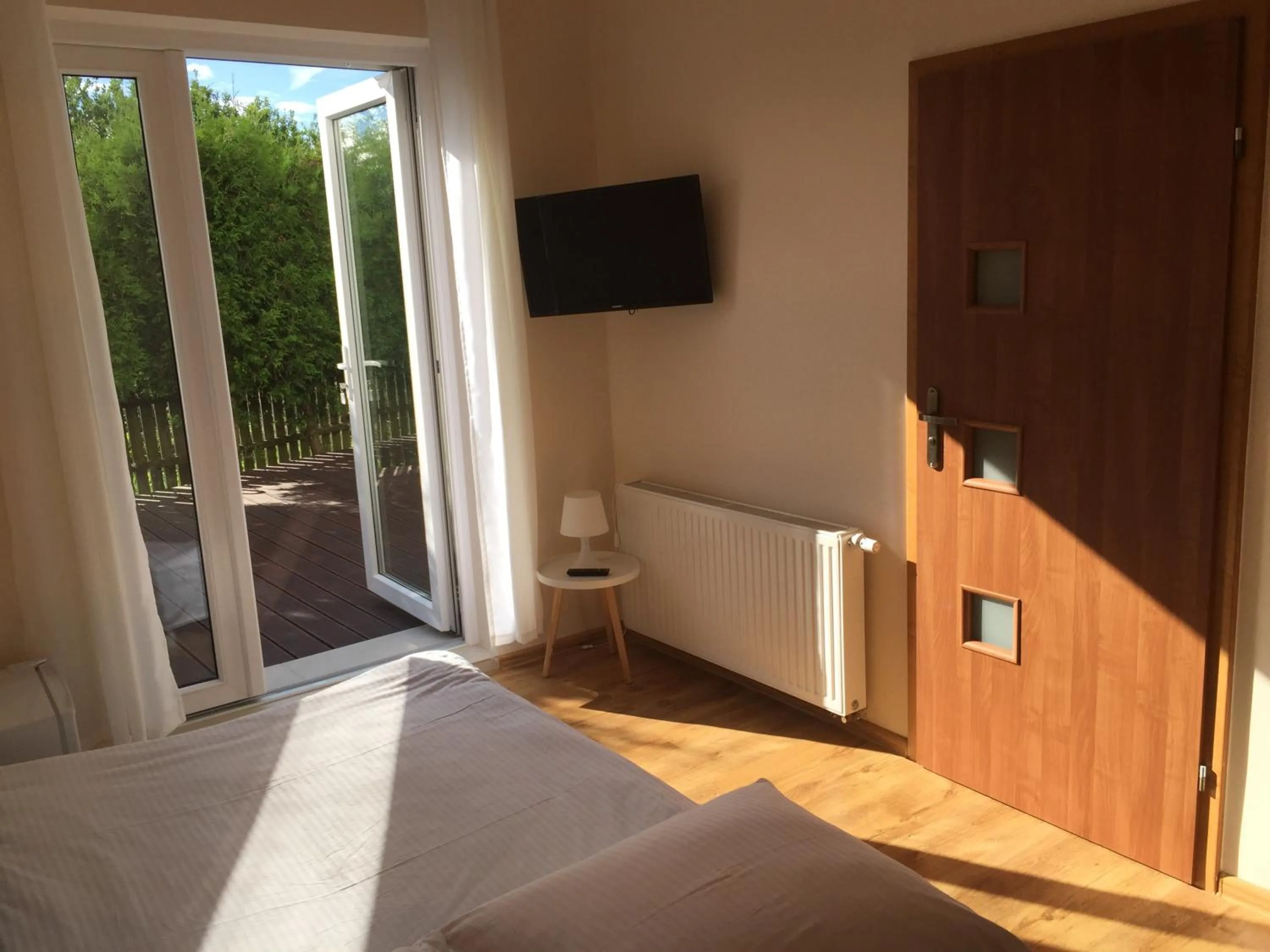 TV and multimedia in Słoneczny Dom pokoje i apartament na wynajem