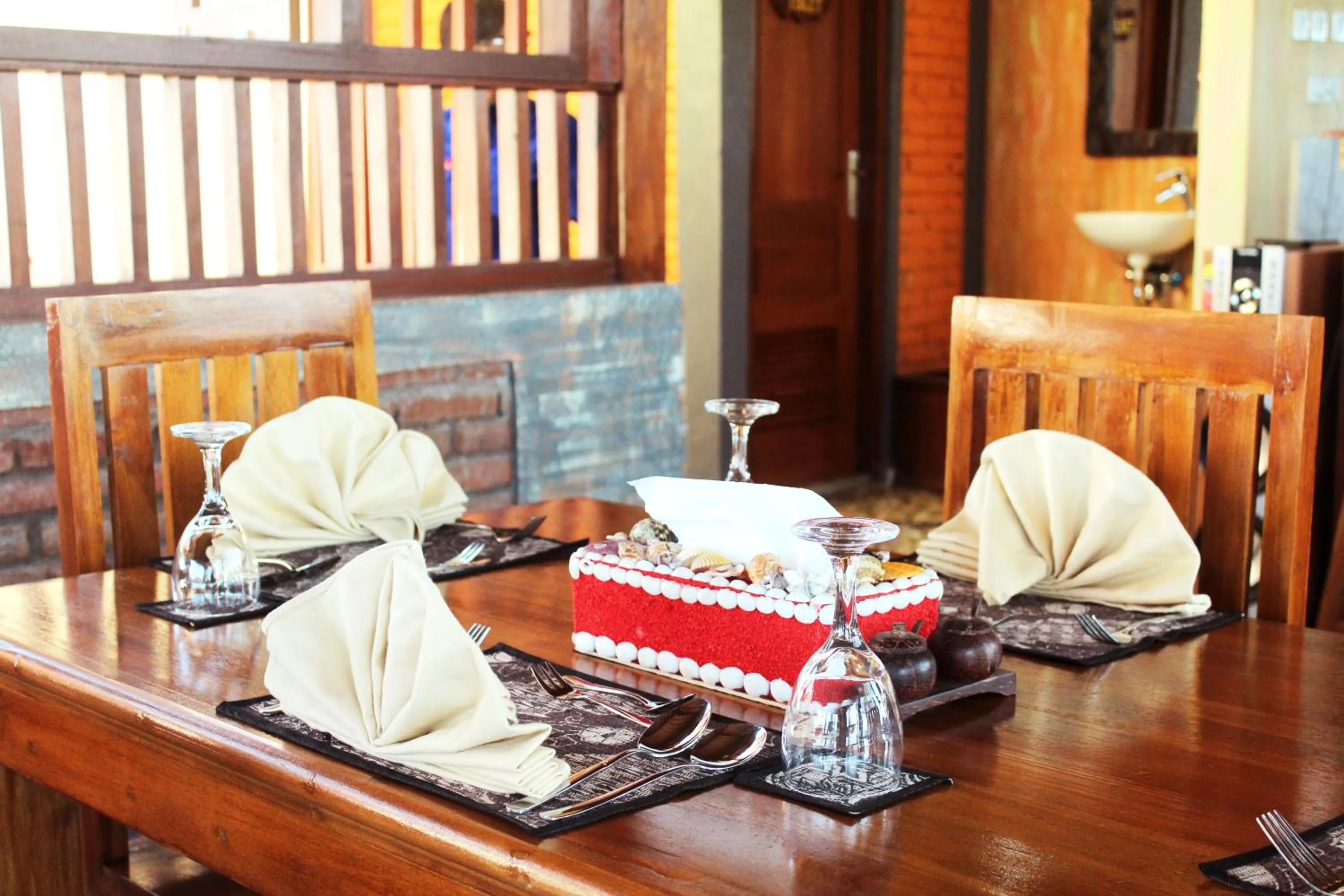 Dining area in The Garuda Villa and Restaurant