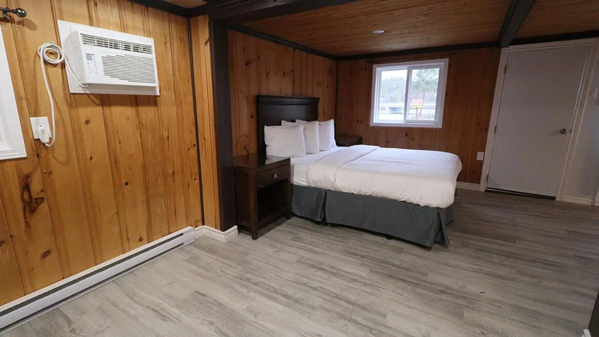 Bed in Algonquin Lakeside Inn
