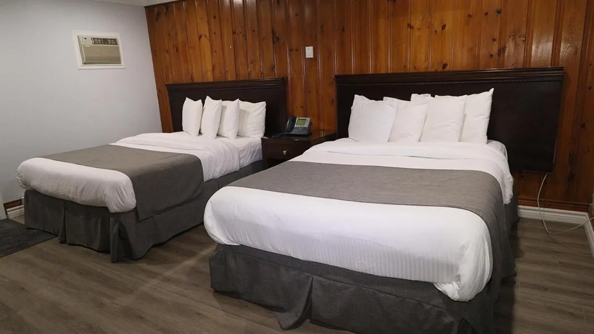 Bed in Algonquin Lakeside Inn