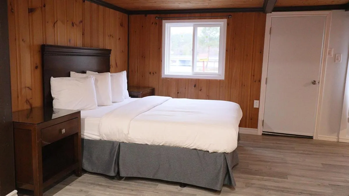 Bed in Algonquin Lakeside Inn