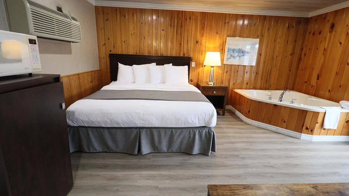 Bed in Algonquin Lakeside Inn