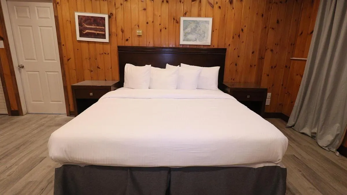 Bed in Algonquin Lakeside Inn
