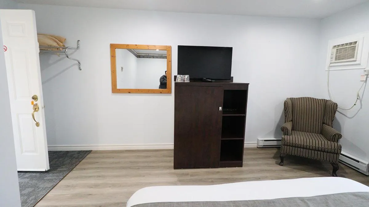 Bed in Algonquin Lakeside Inn