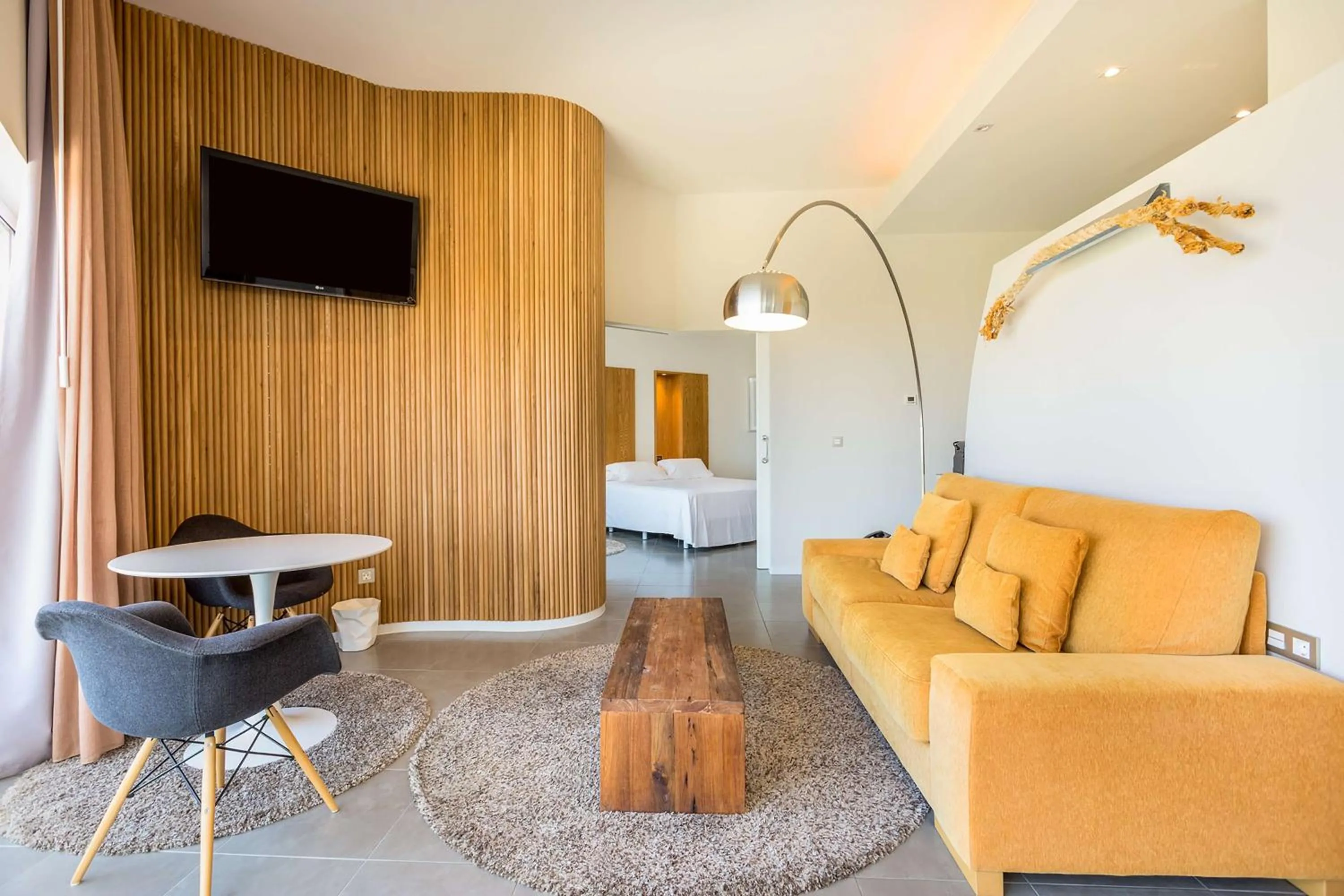 Living room in Higuerón Hotel Málaga, Curio Collection by Hilton