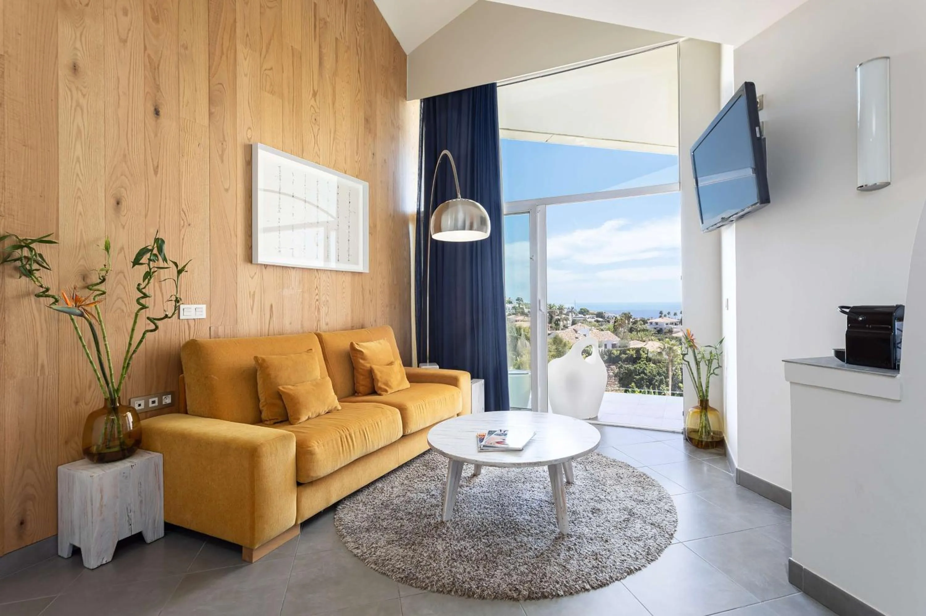 Living room in Higuerón Hotel Málaga, Curio Collection by Hilton