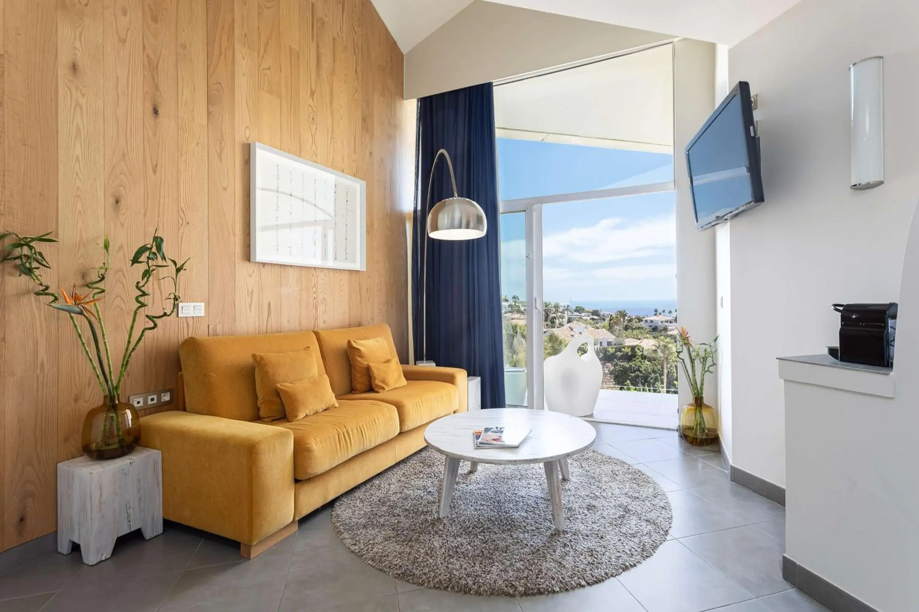 Living room in Higuerón Hotel Curio Collection by Hilton Living room in Higuerón Hotel Curio Collection by Hilton