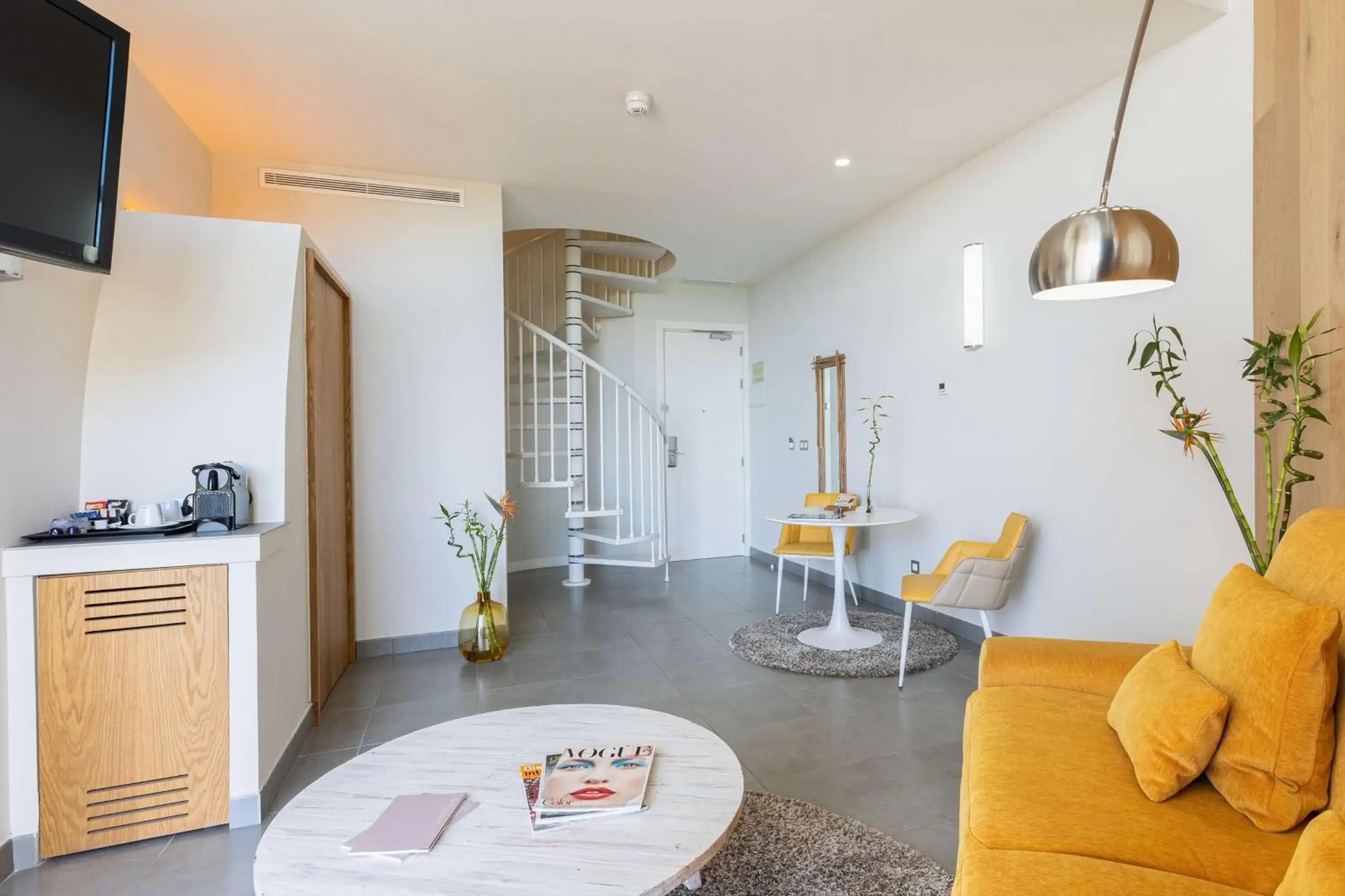 Living room in Higuerón Hotel Curio Collection by Hilton Living room in Higuerón Hotel Curio Collection by Hilton