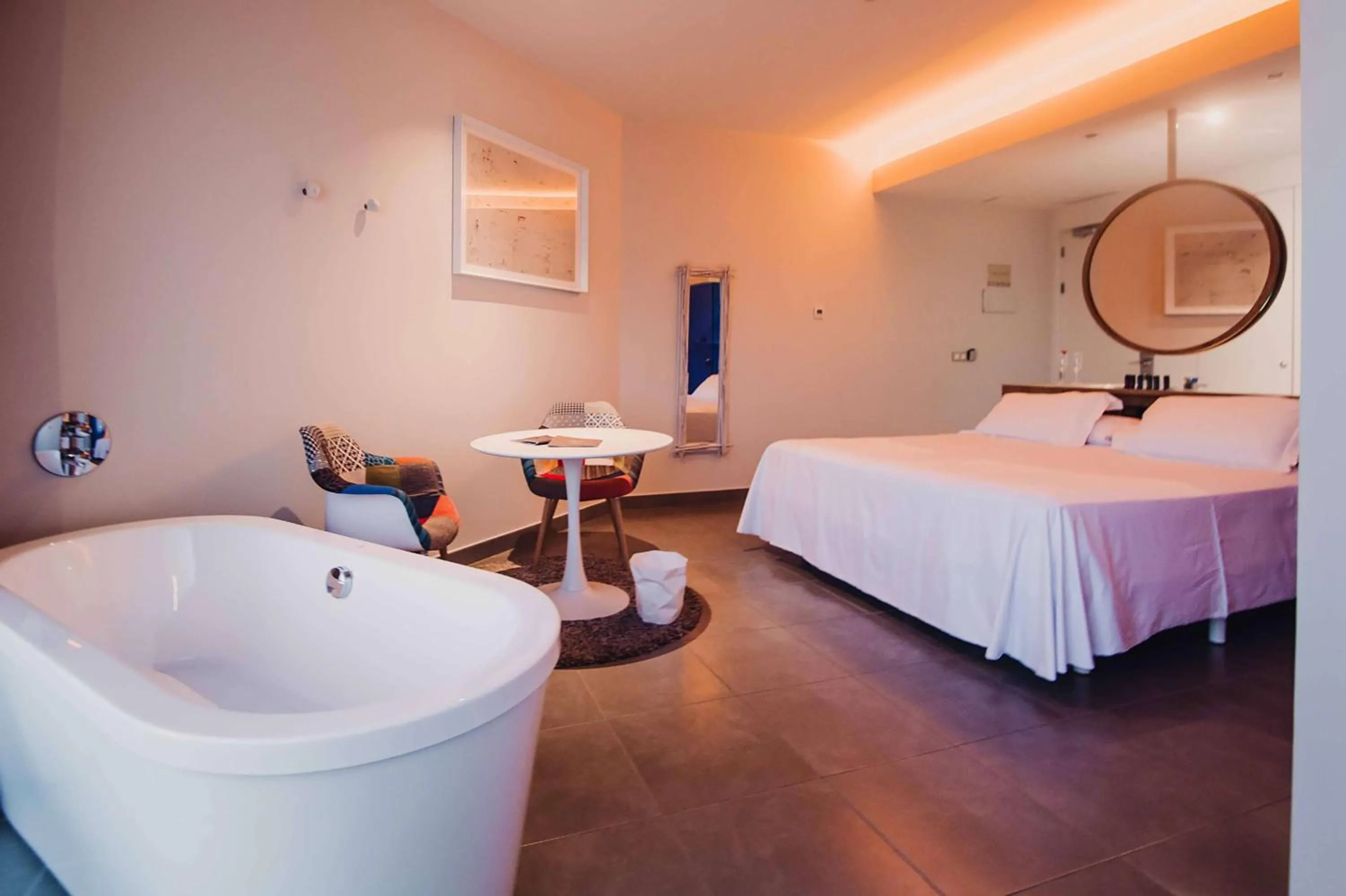 Bathroom, Bed in Higuerón Hotel Málaga, Curio Collection by Hilton