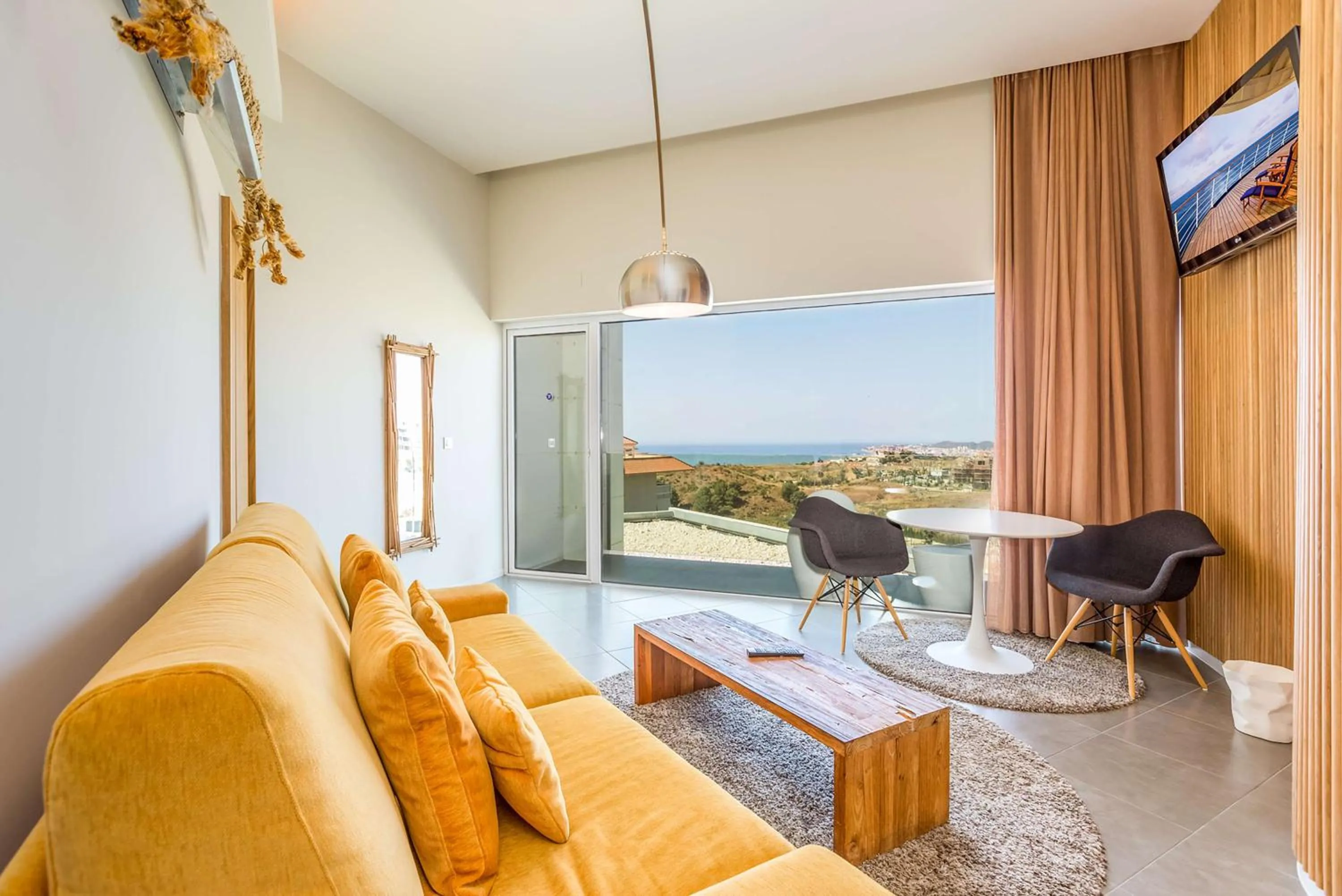 Living room in Higuerón Hotel Málaga, Curio Collection by Hilton