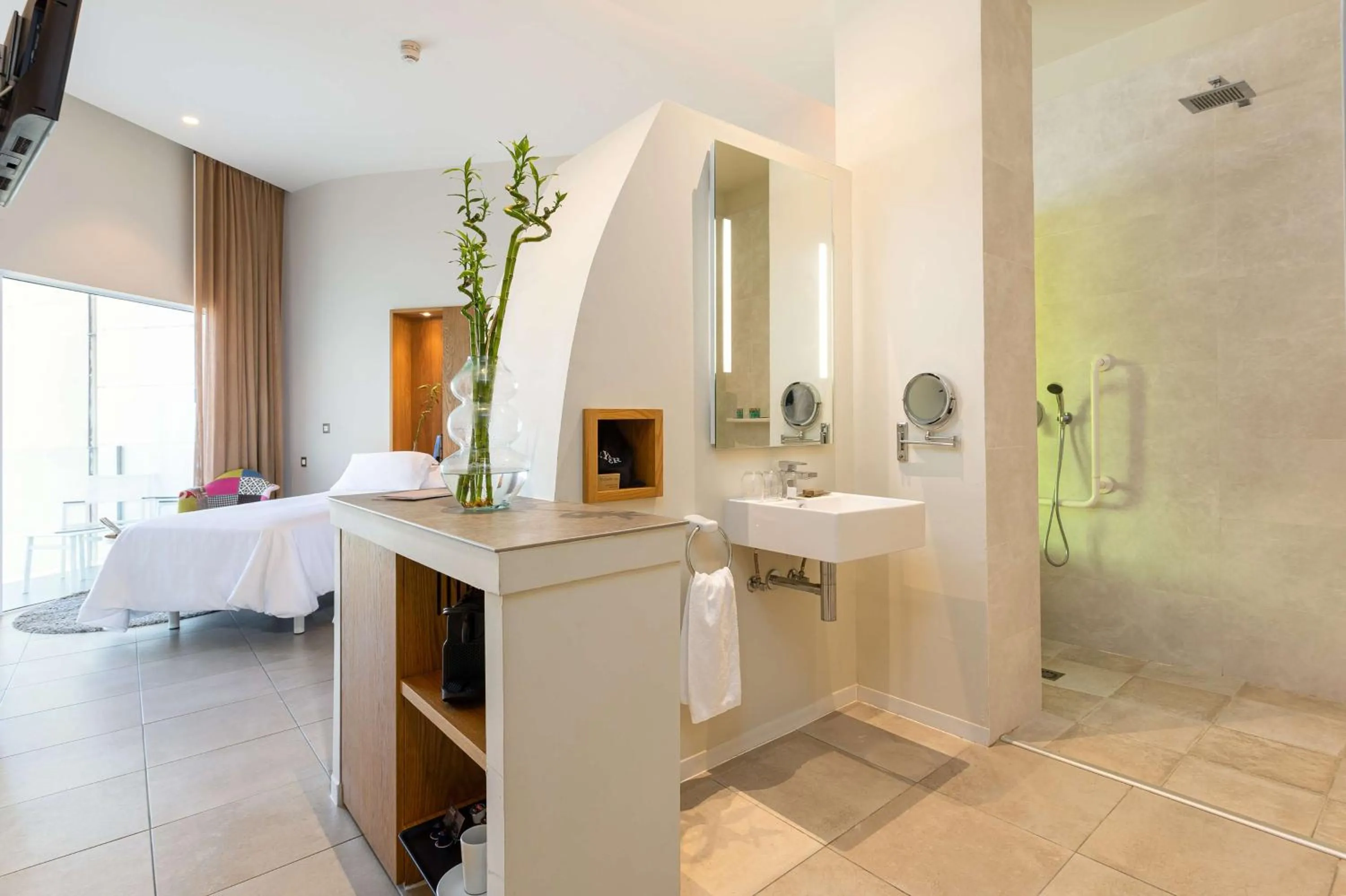 Bathroom in Higuerón Hotel Málaga, Curio Collection by Hilton