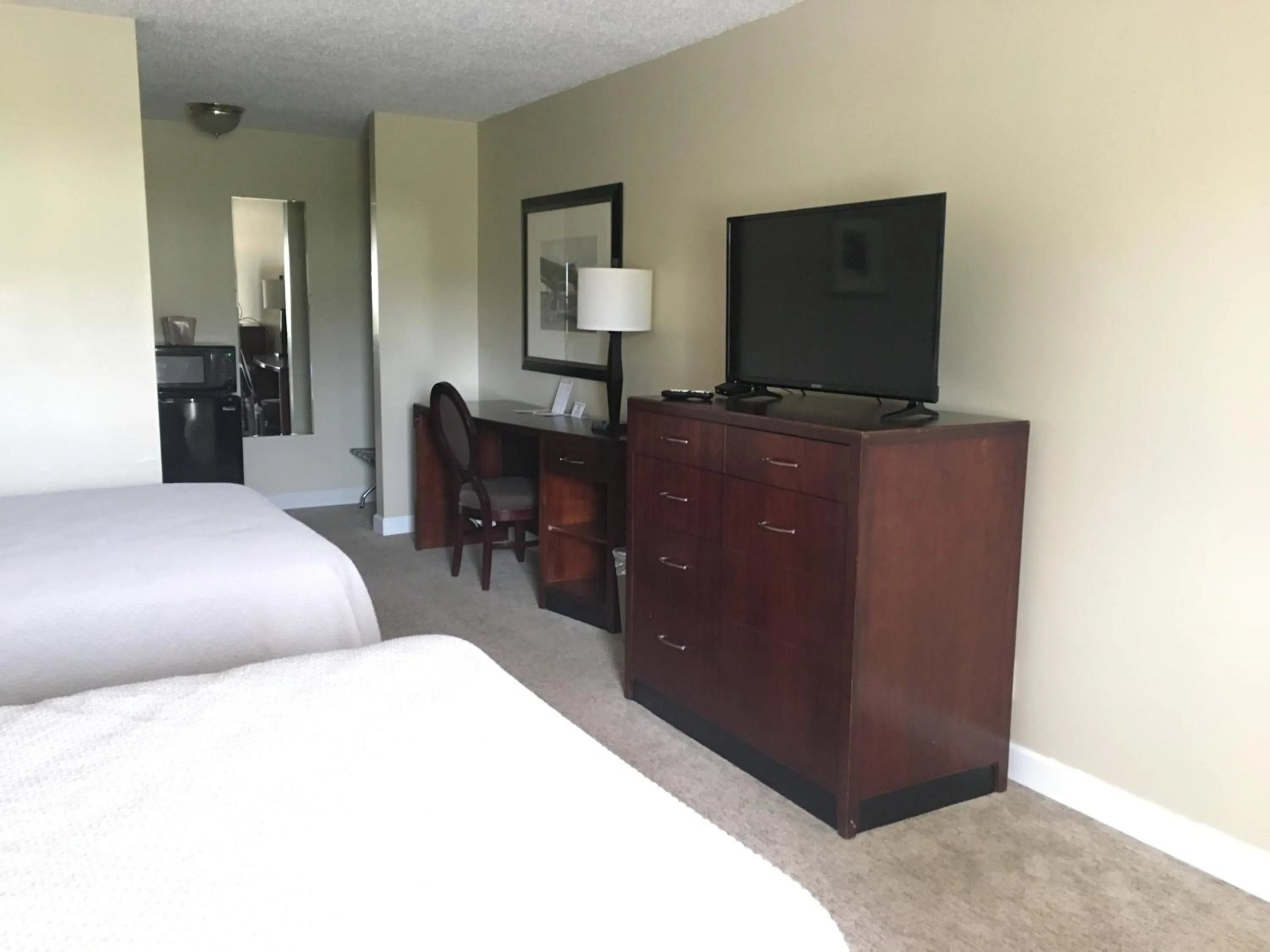 Bed in Ambassador Inn