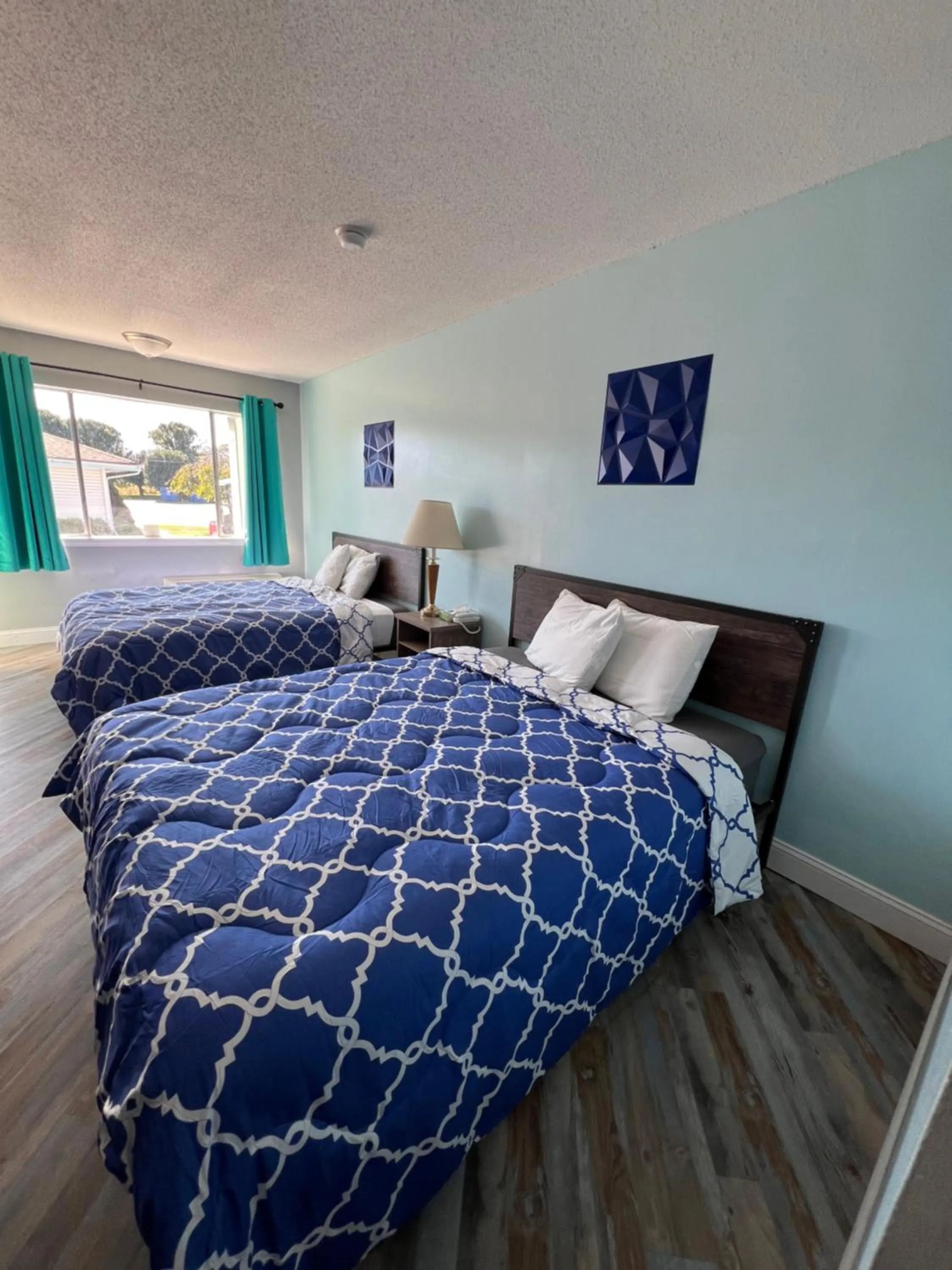 Bed in Ambassador Inn