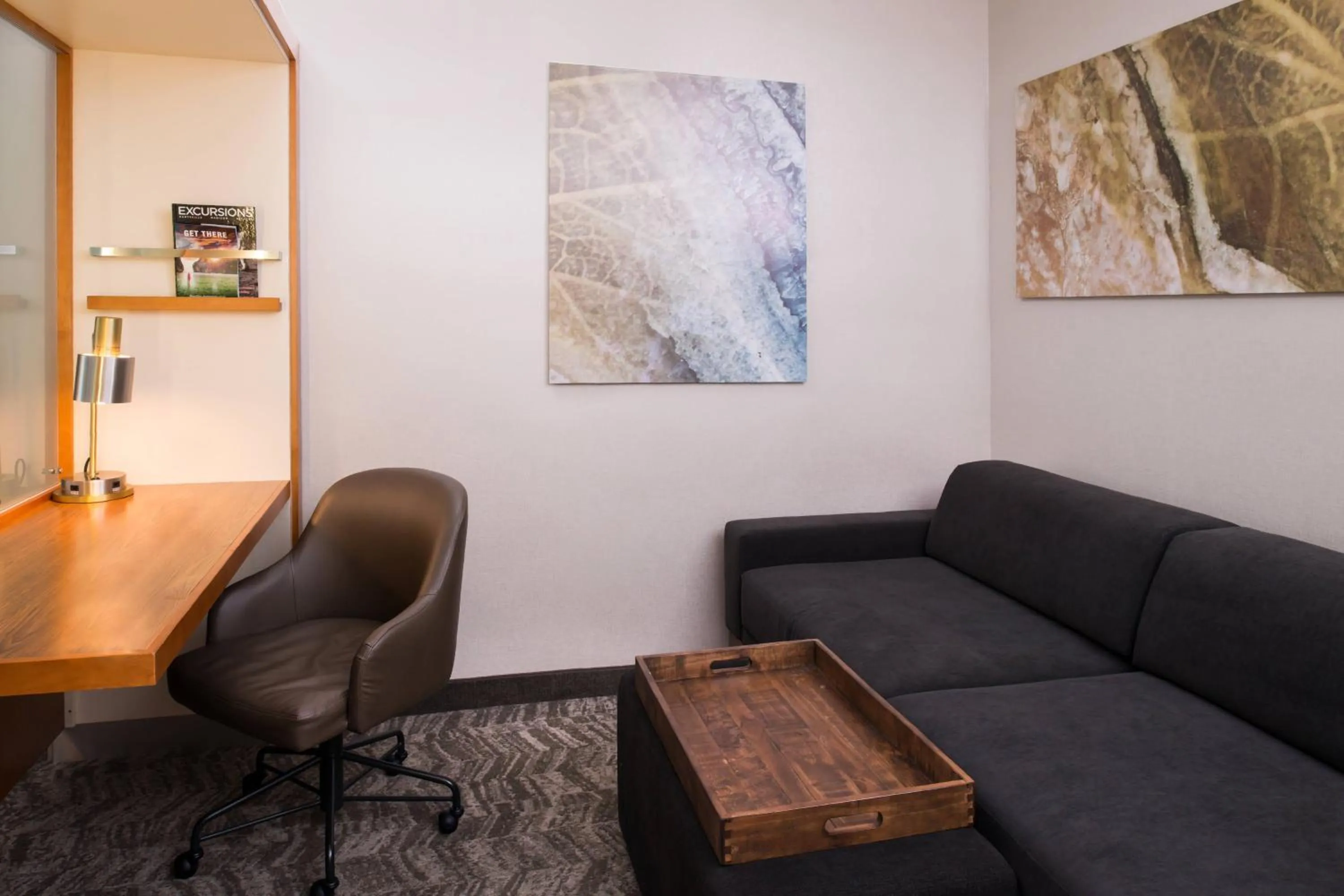 Living room in SpringHill Suites by Marriott Huntsville Downtown