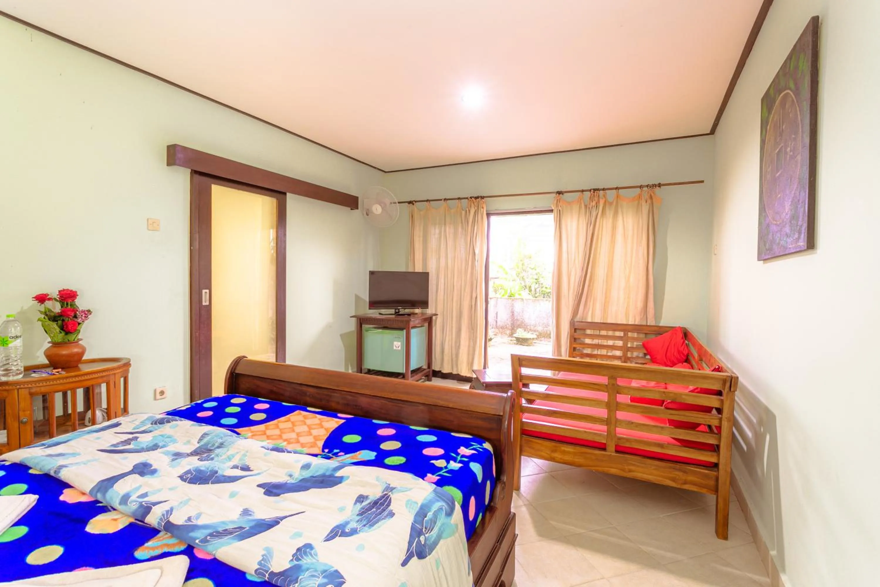 Communal lounge/ TV room, Bed in Pacung Indah Hotel & Restaurant by ecommerceloka