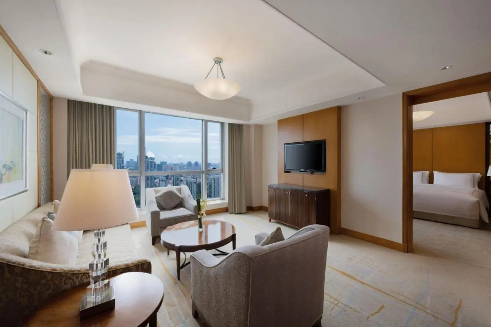 Living room, Bed in DoubleTree by Hilton Shanghai Pudong - Present welcome cookie Living room, Bed in DoubleTree by Hilton Shanghai Pudong - Present welcome cookie