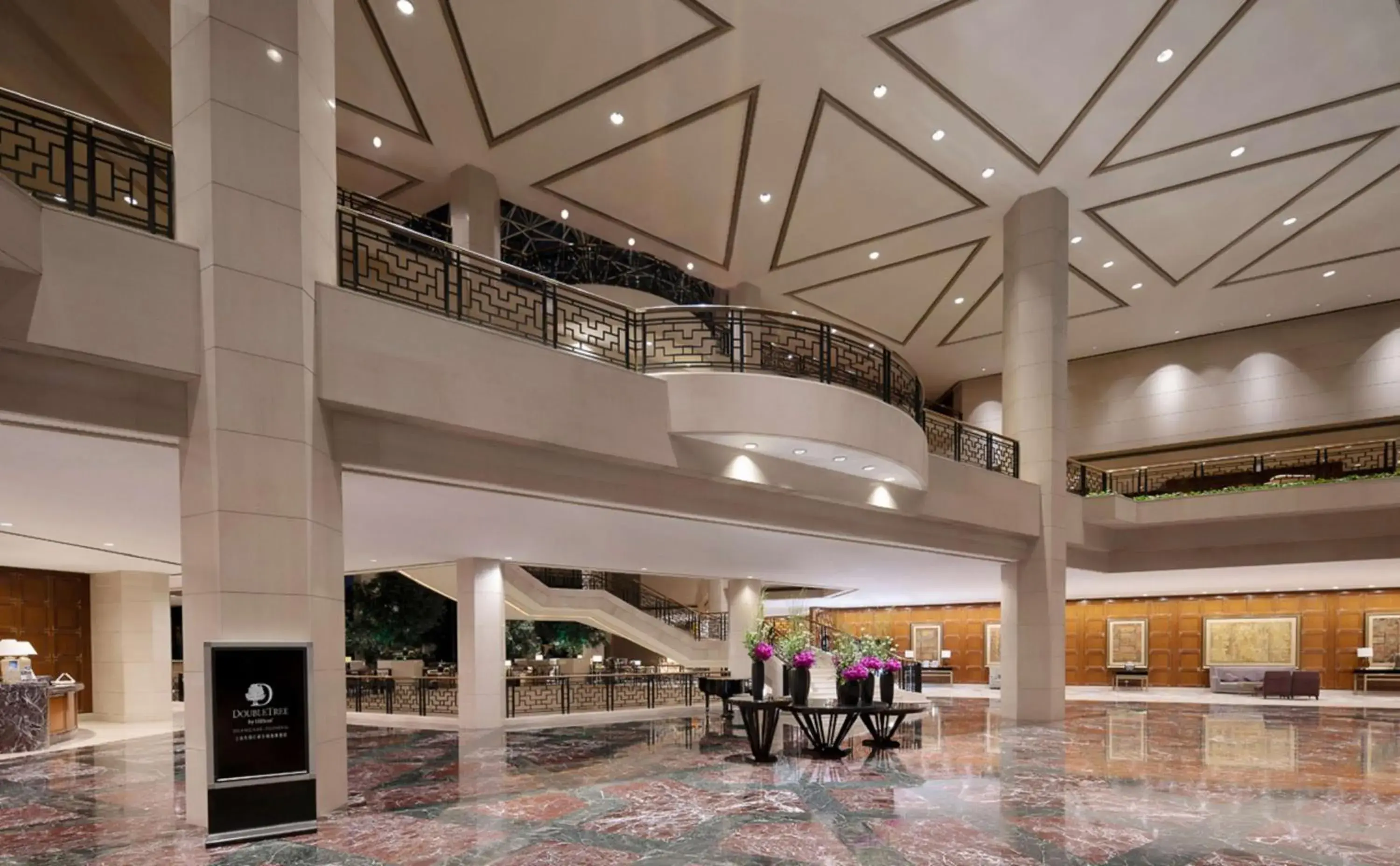 Lobby or reception in DoubleTree by Hilton Shanghai Pudong - Present welcome cookie Lobby or reception in DoubleTree by Hilton Shanghai Pudong - Present welcome cookie