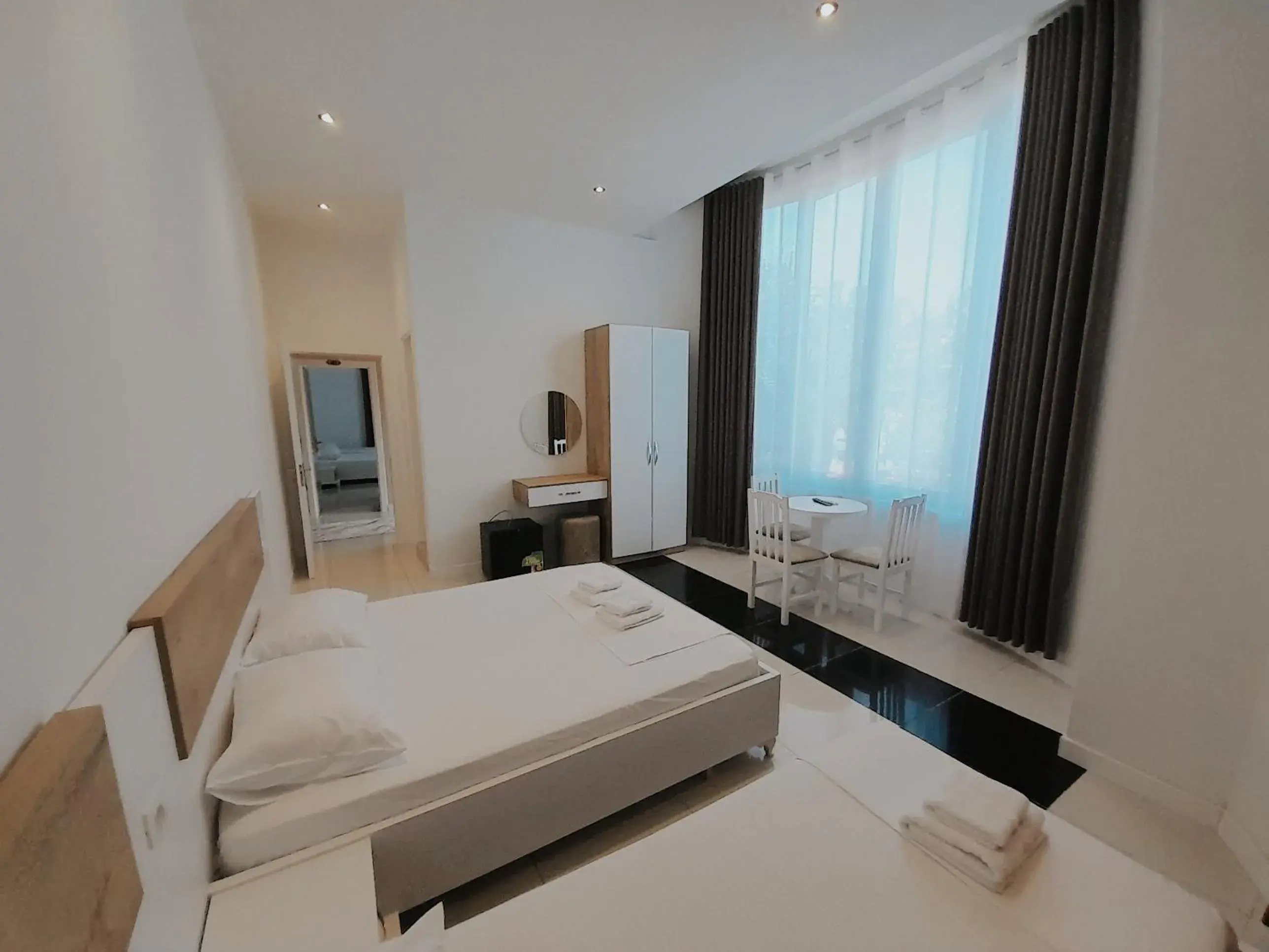 Luxury Triple Room in Hotel Restaurant Univers Luxury Triple Room in Hotel Restaurant Univers