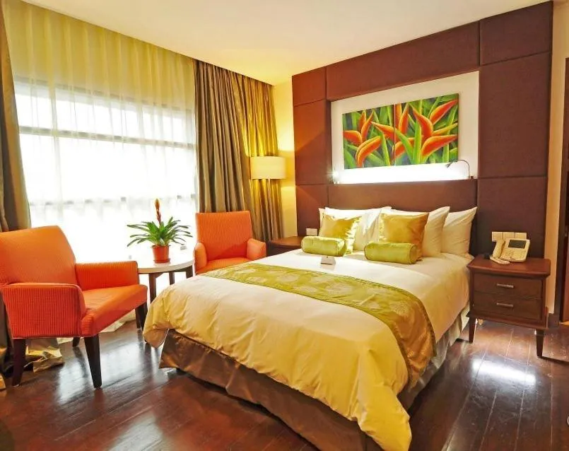 Bed in The Cocoon Boutique Hotel