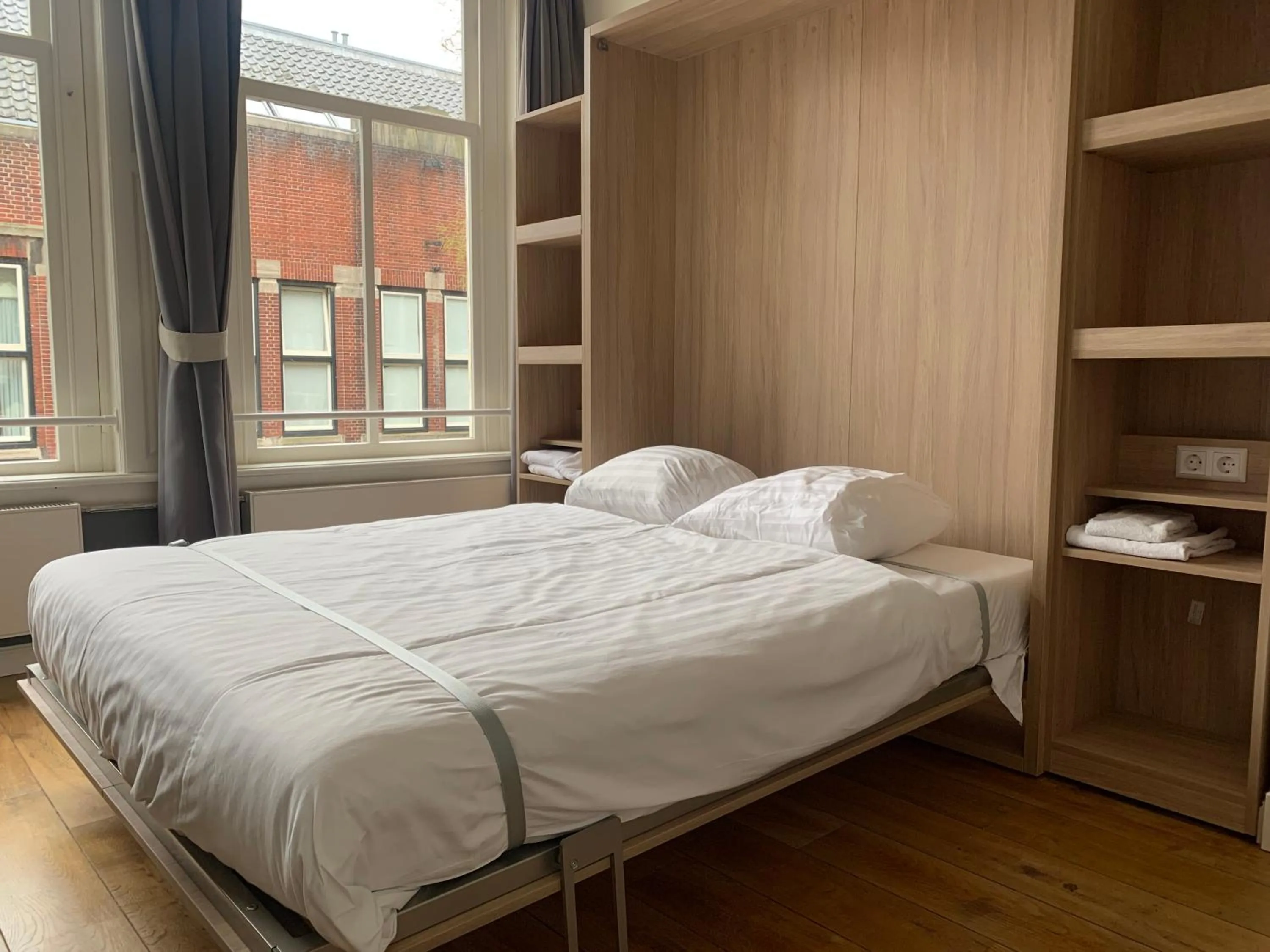 Bed in Plantage Hortus Apartments