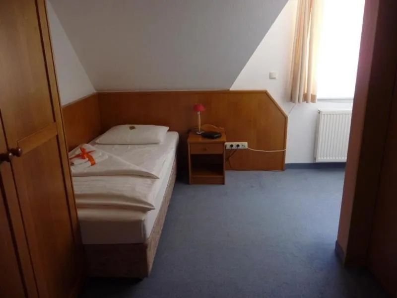 Bed in Hotel Mecklenburger Mühle Garni