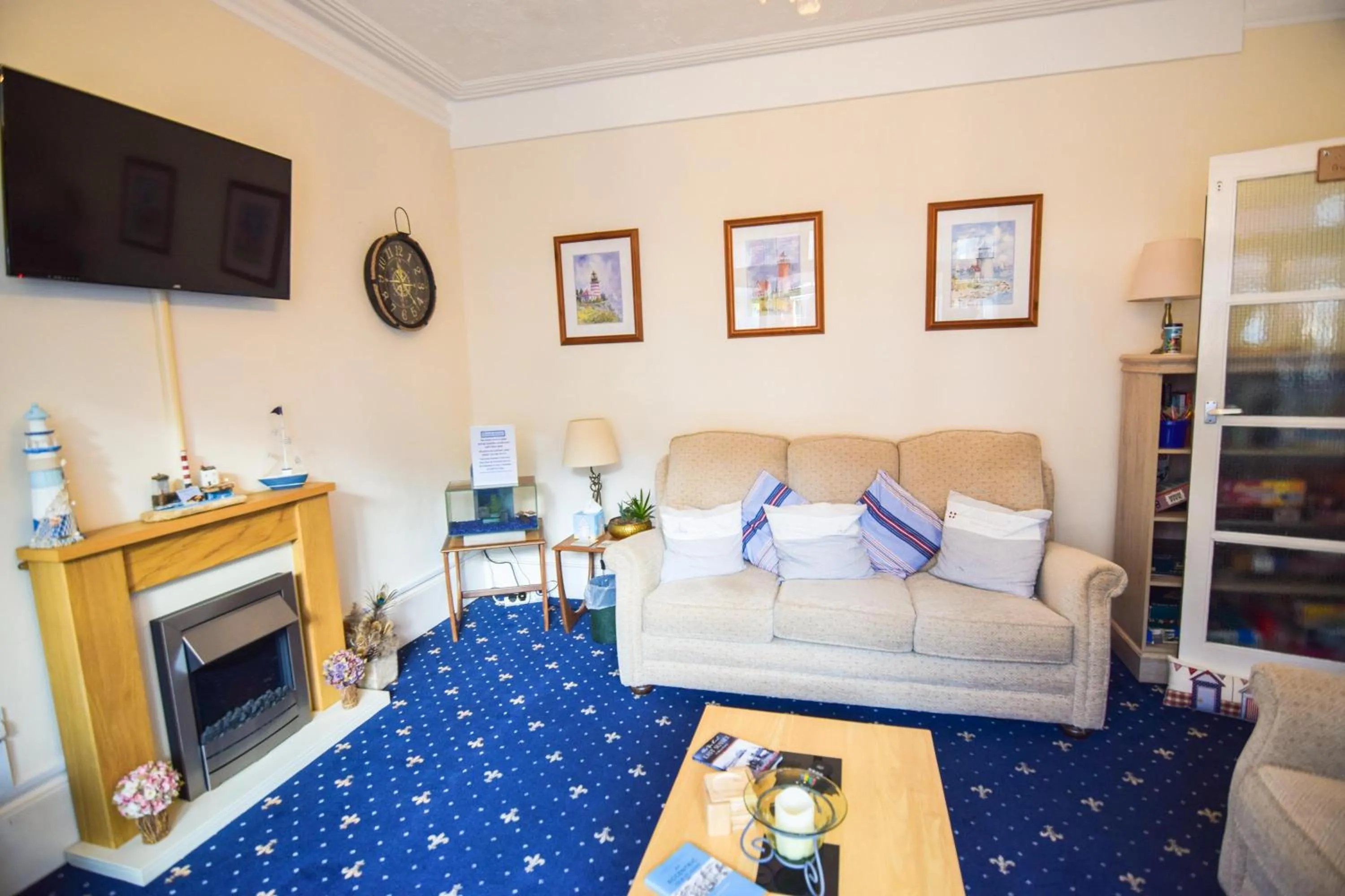 Communal lounge/ TV room in Eastbourne Reymar