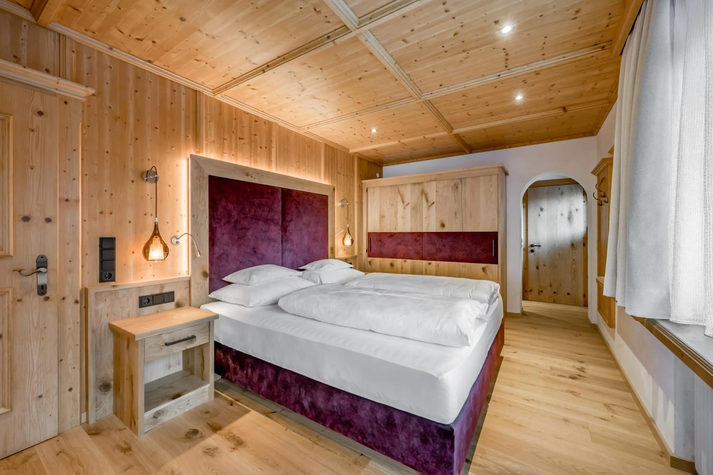 Photo of the whole room, Bed in Naturhotel Alpenblick