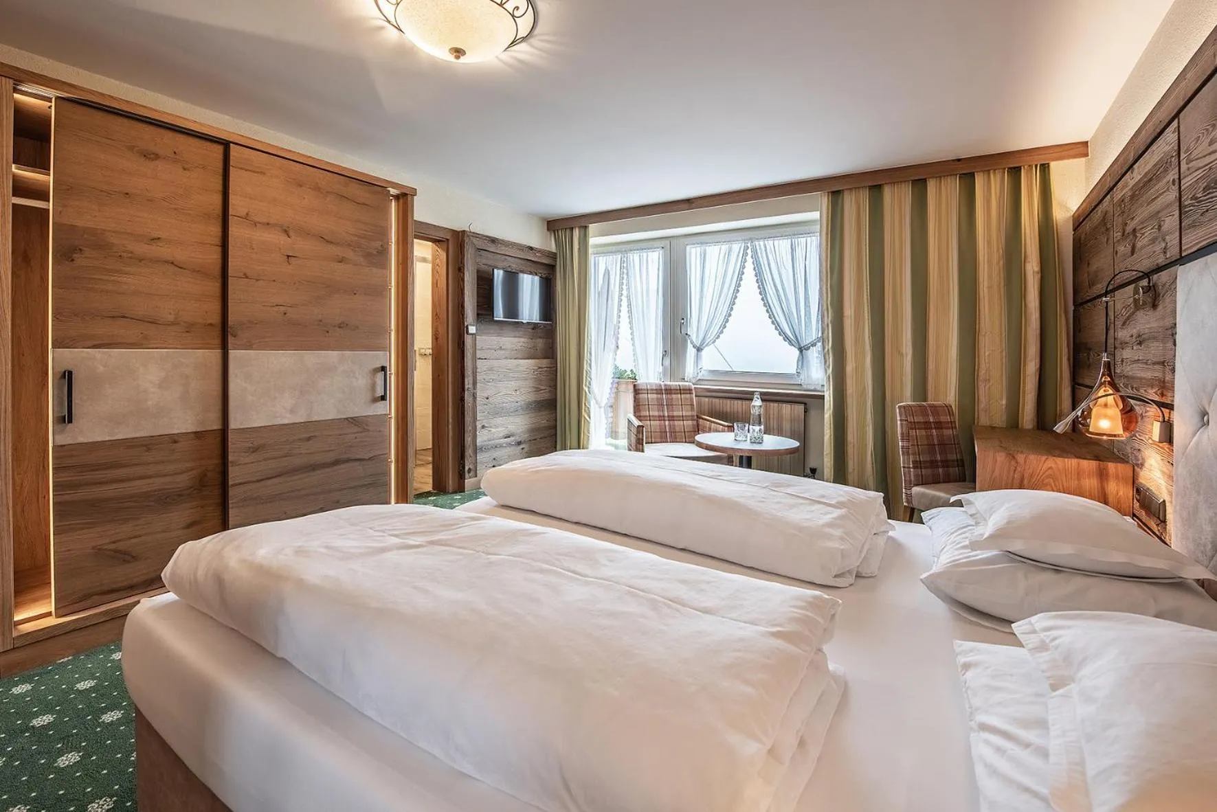 Bed in Naturhotel Alpenblick