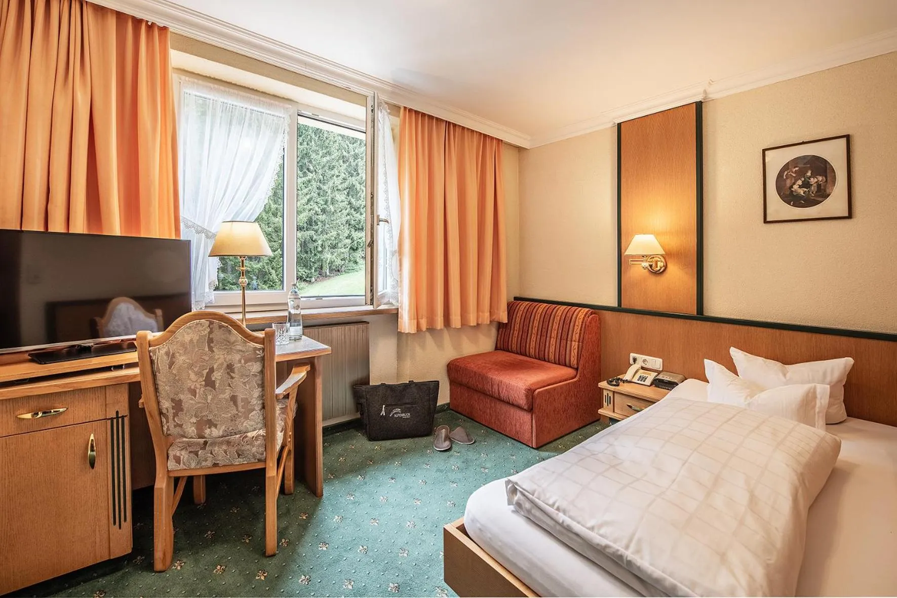 Photo of the whole room, Bed in Naturhotel Alpenblick