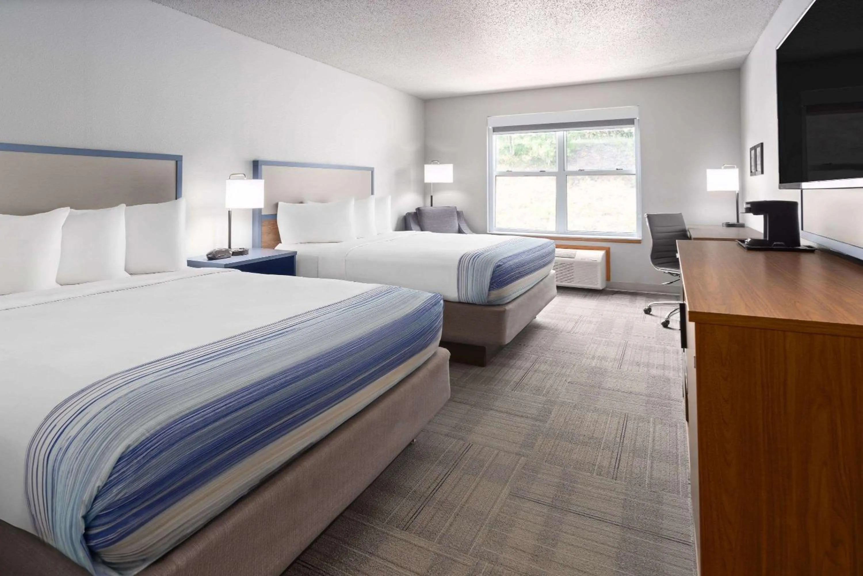 Photo of the whole room, Bed in AmericInn by Wyndham Iron Mountain