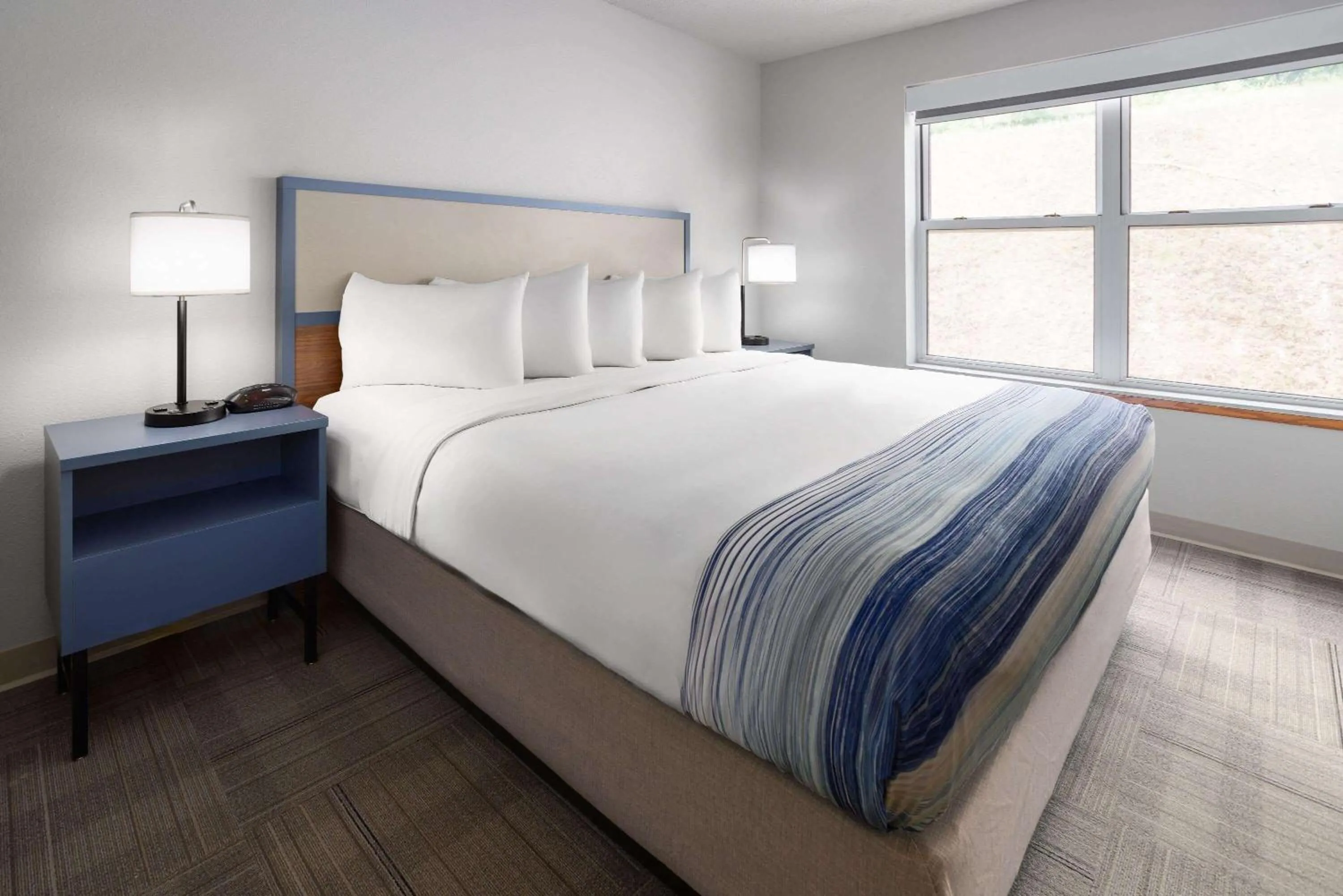 Photo of the whole room, Bed in AmericInn by Wyndham Iron Mountain