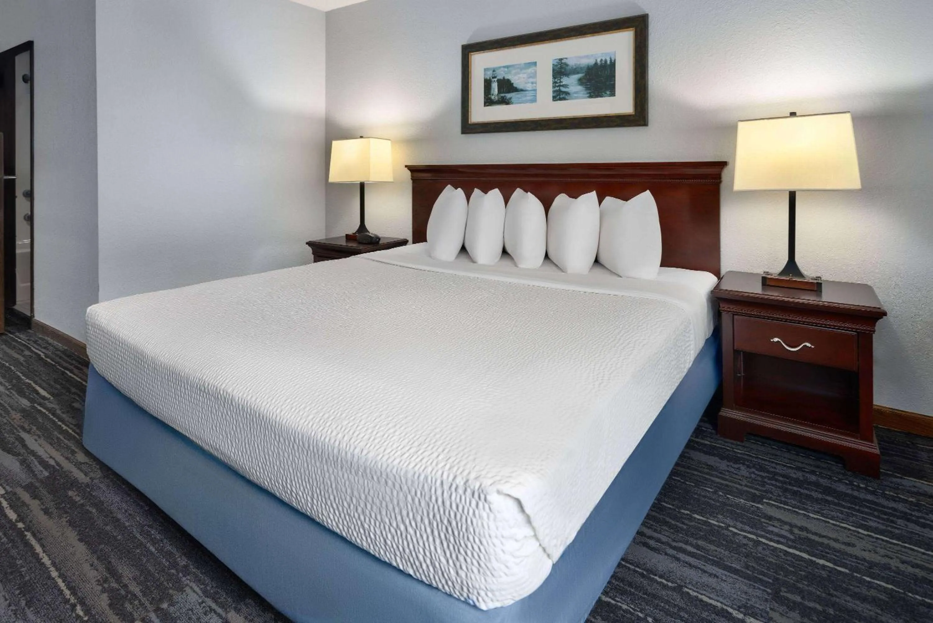Photo of the whole room, Bed in Days Inn by Wyndham Iron Mountain