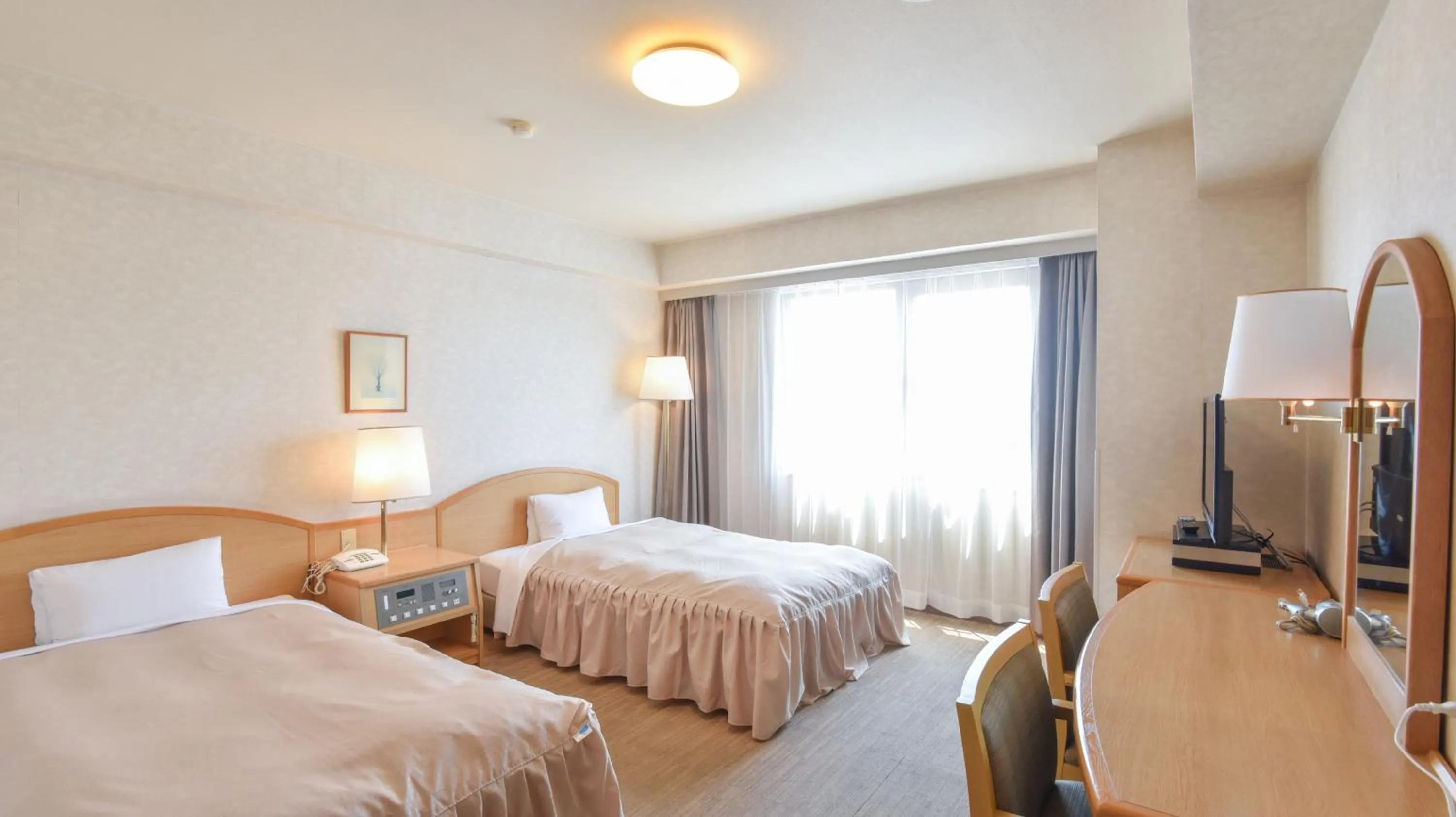 Bed in Yokkaichi City Hotel Annex