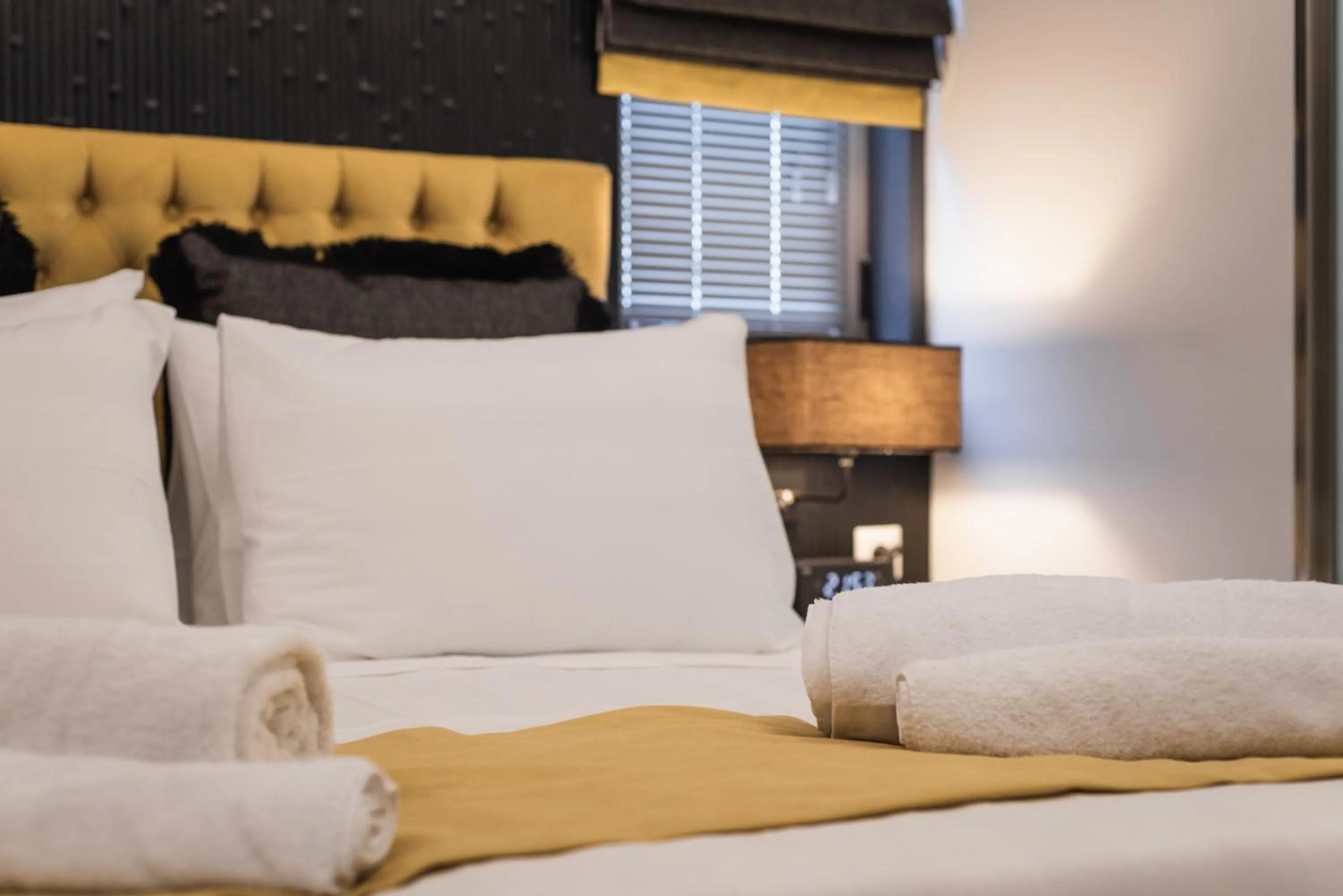 Bed in Acropolis Luxury Living