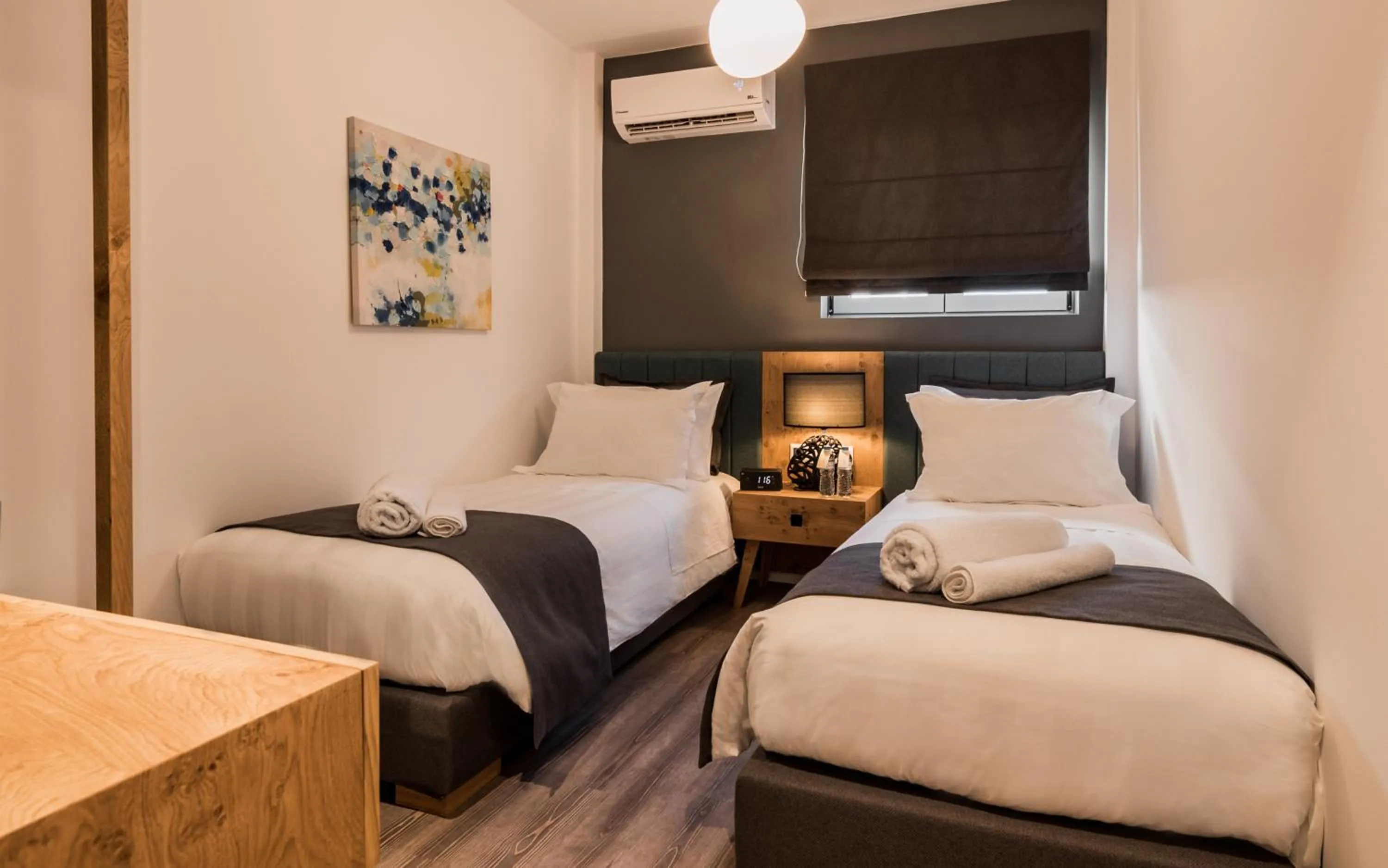 Bed in Acropolis Luxury Living