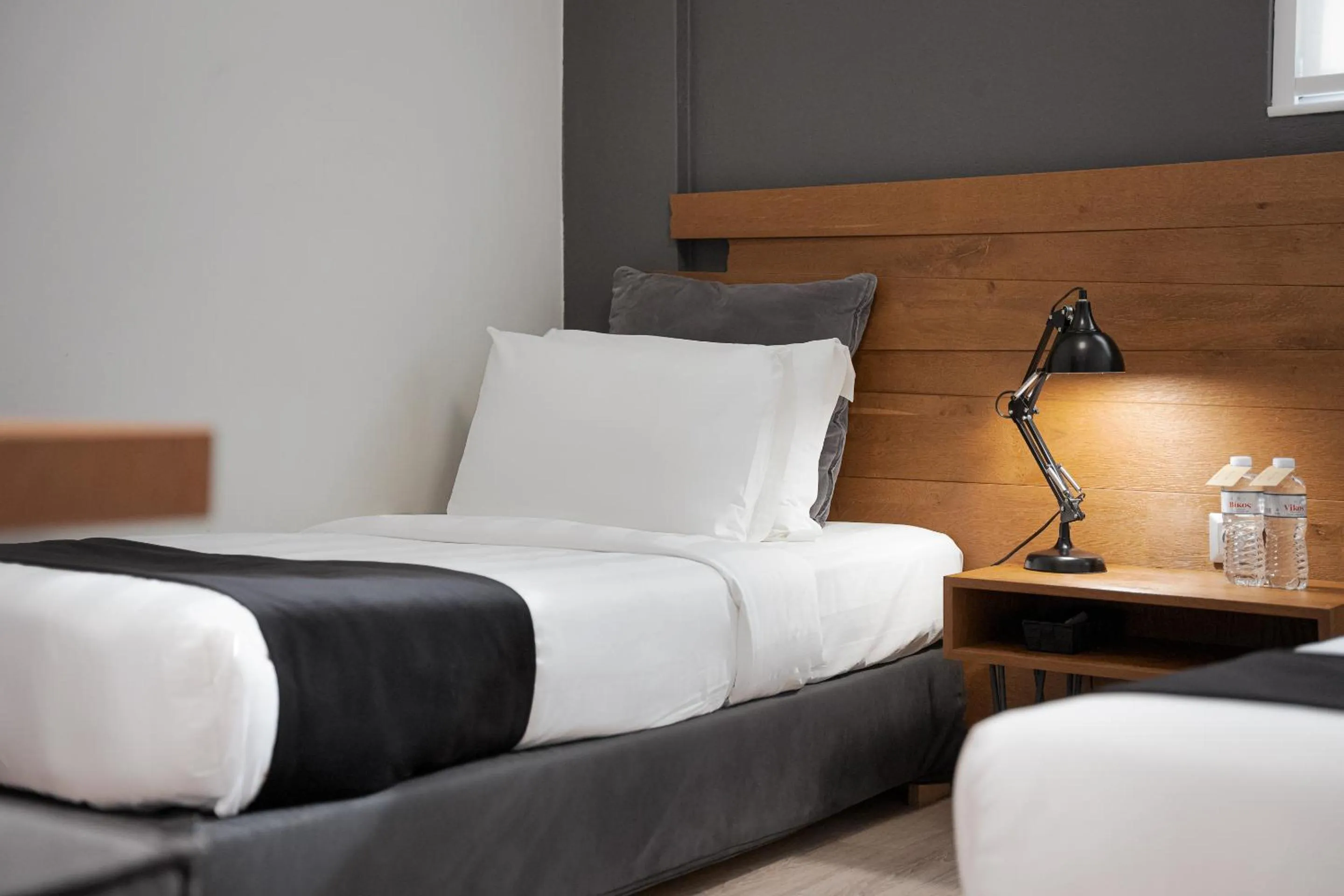 Bed in Acropolis Luxury Living