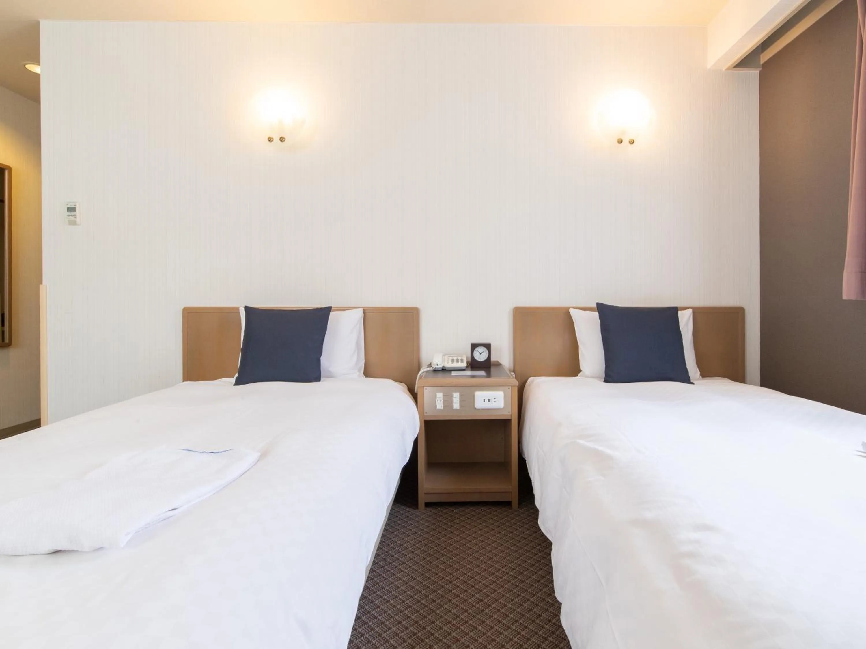 Bed in Nagasaki Orion Hotel