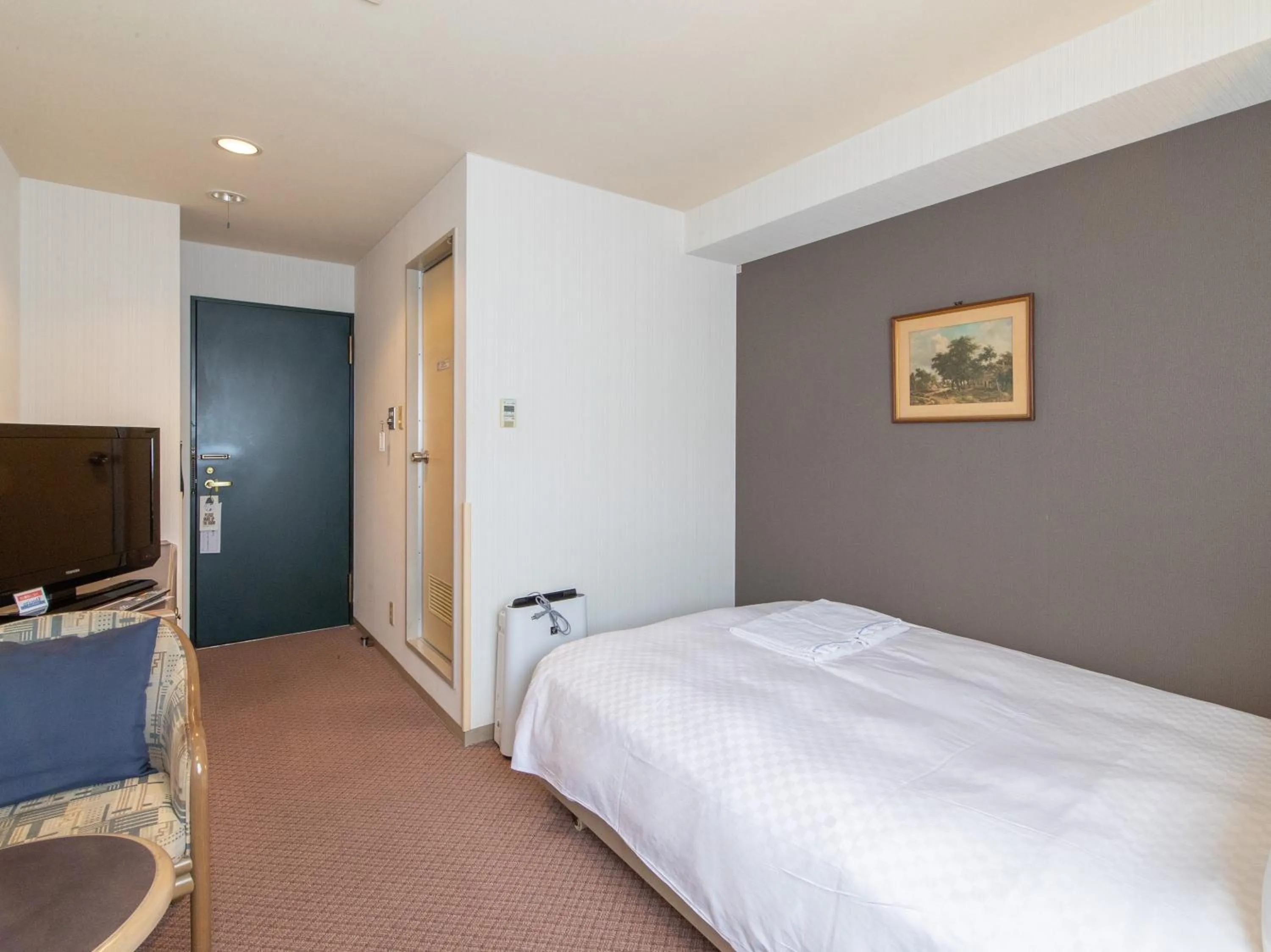 Bed in Nagasaki Orion Hotel