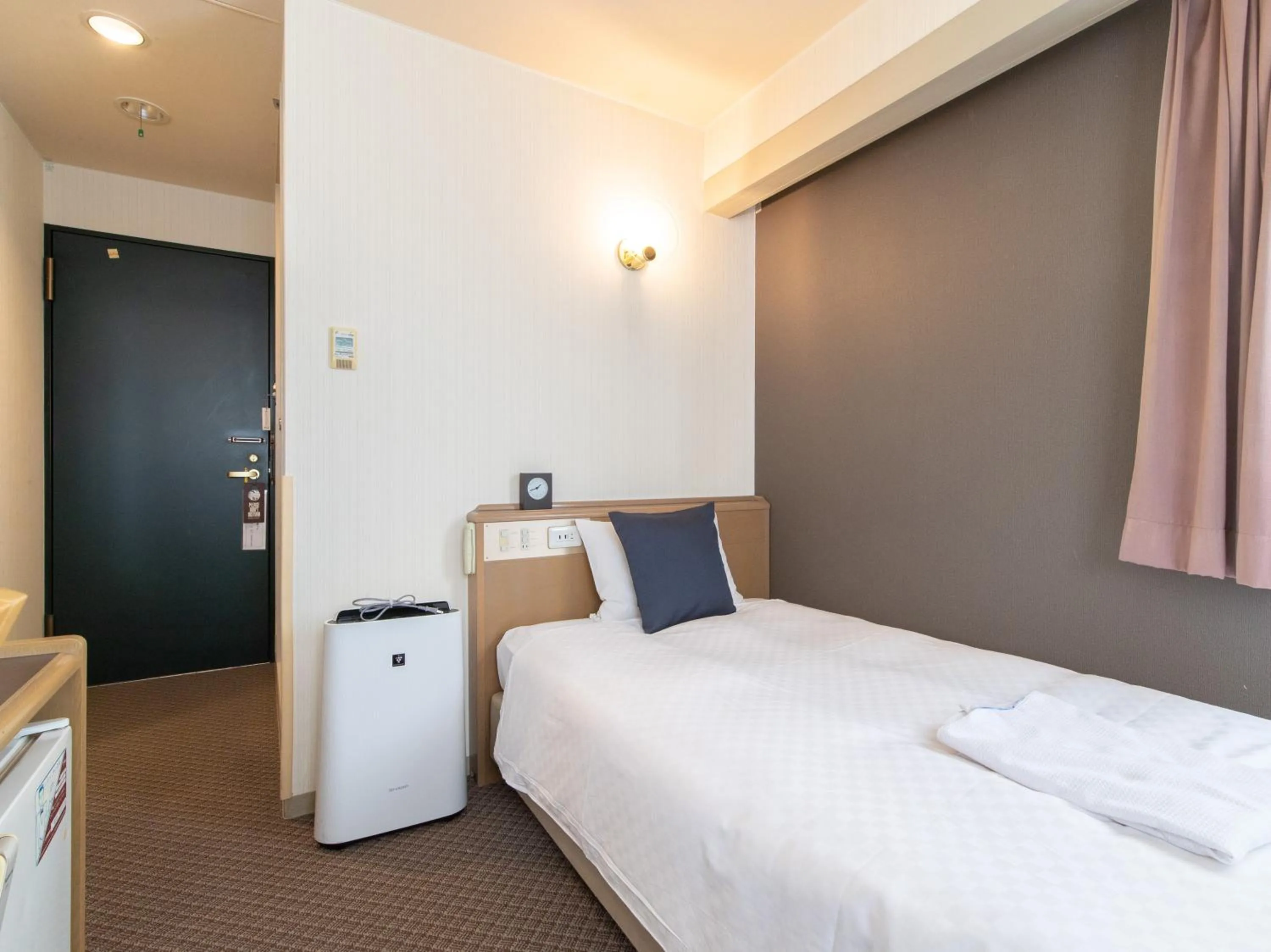 Bed in Nagasaki Orion Hotel