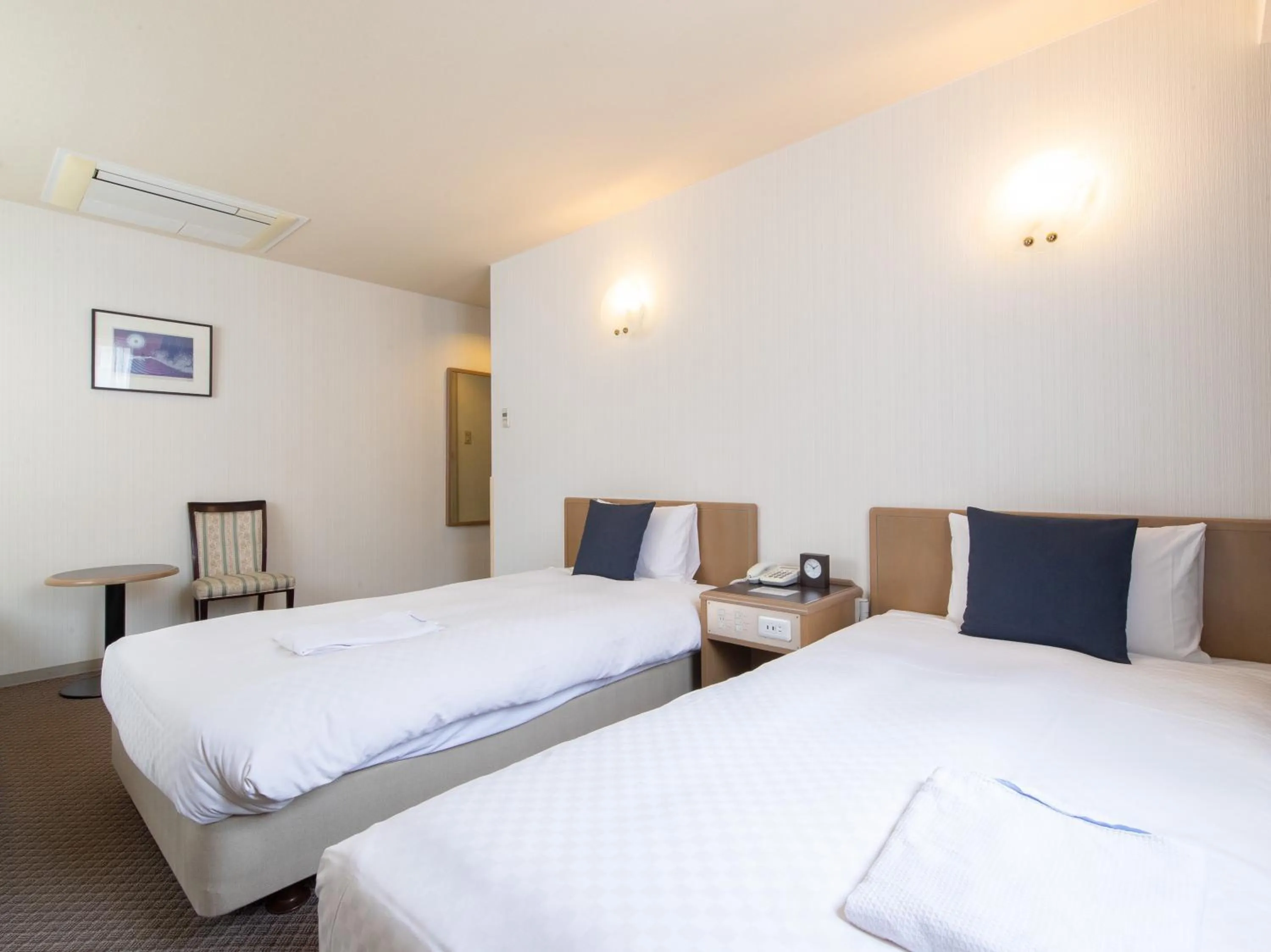 Bed in Nagasaki Orion Hotel