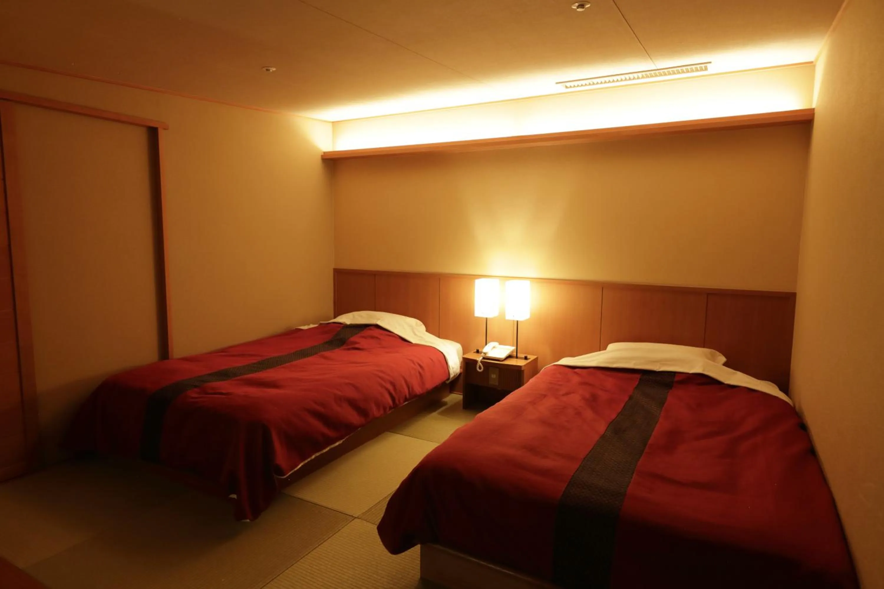 Bed in Hotel Nanpuso