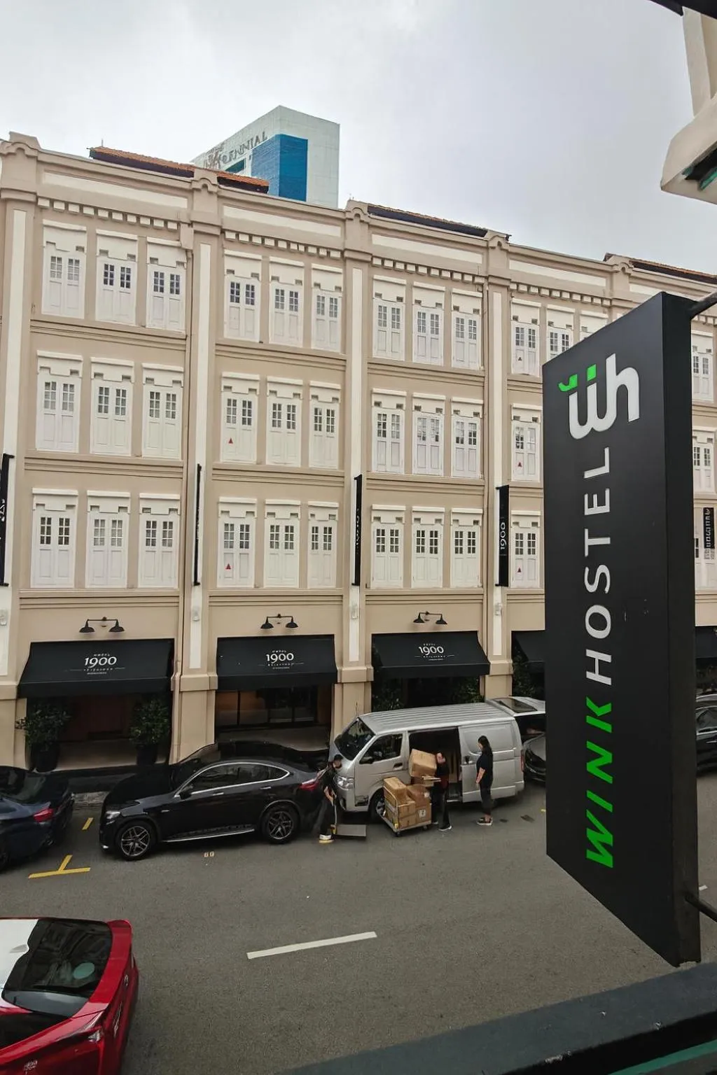 Property logo or sign in Wink at Mosque Street