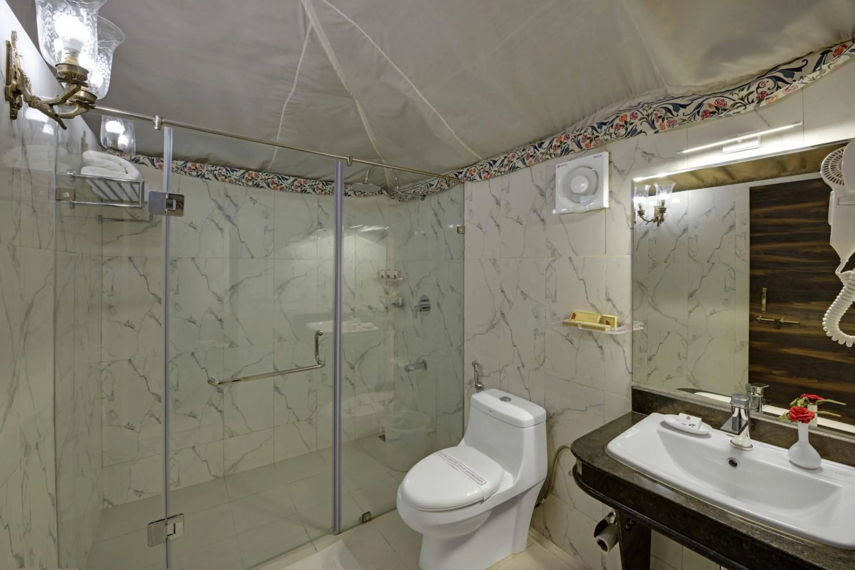 Bathroom in Gir Lion Safari Camp by Trulyy, Sasan Gir