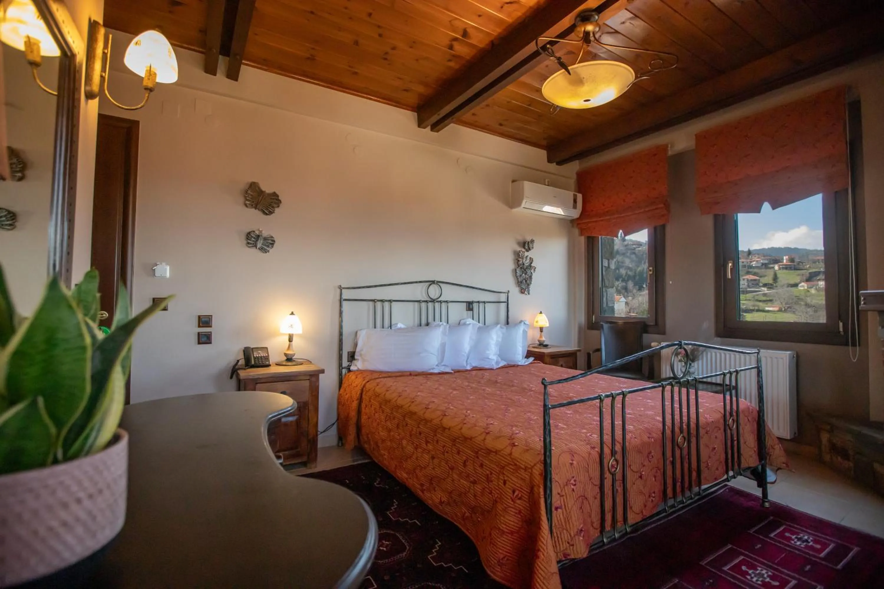 Bed in Pandion Luxury Boutique Hotel & Suites with Spa