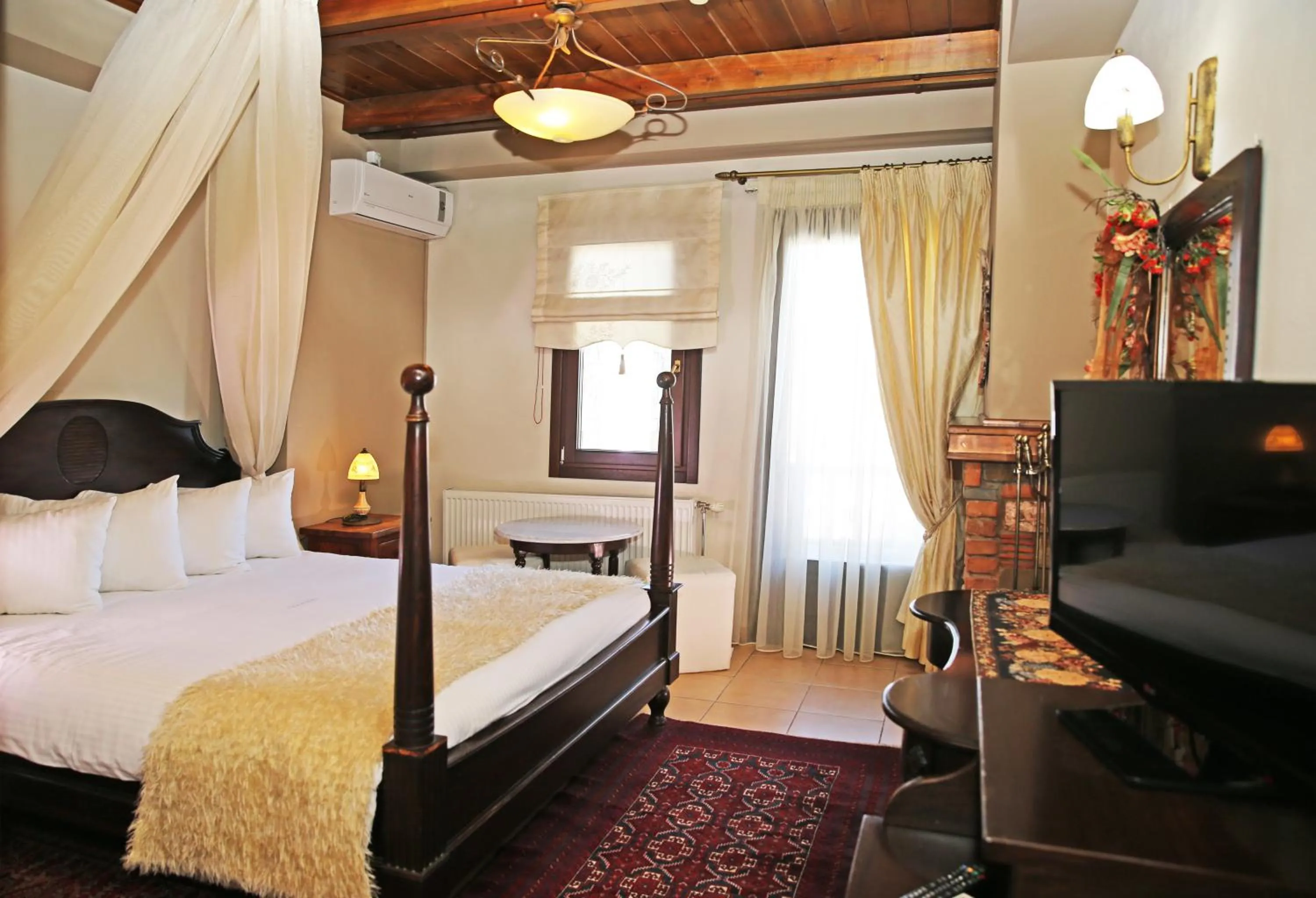 Photo of the whole room, Bed in Pandion Luxury Boutique Hotel & Suites with Spa
