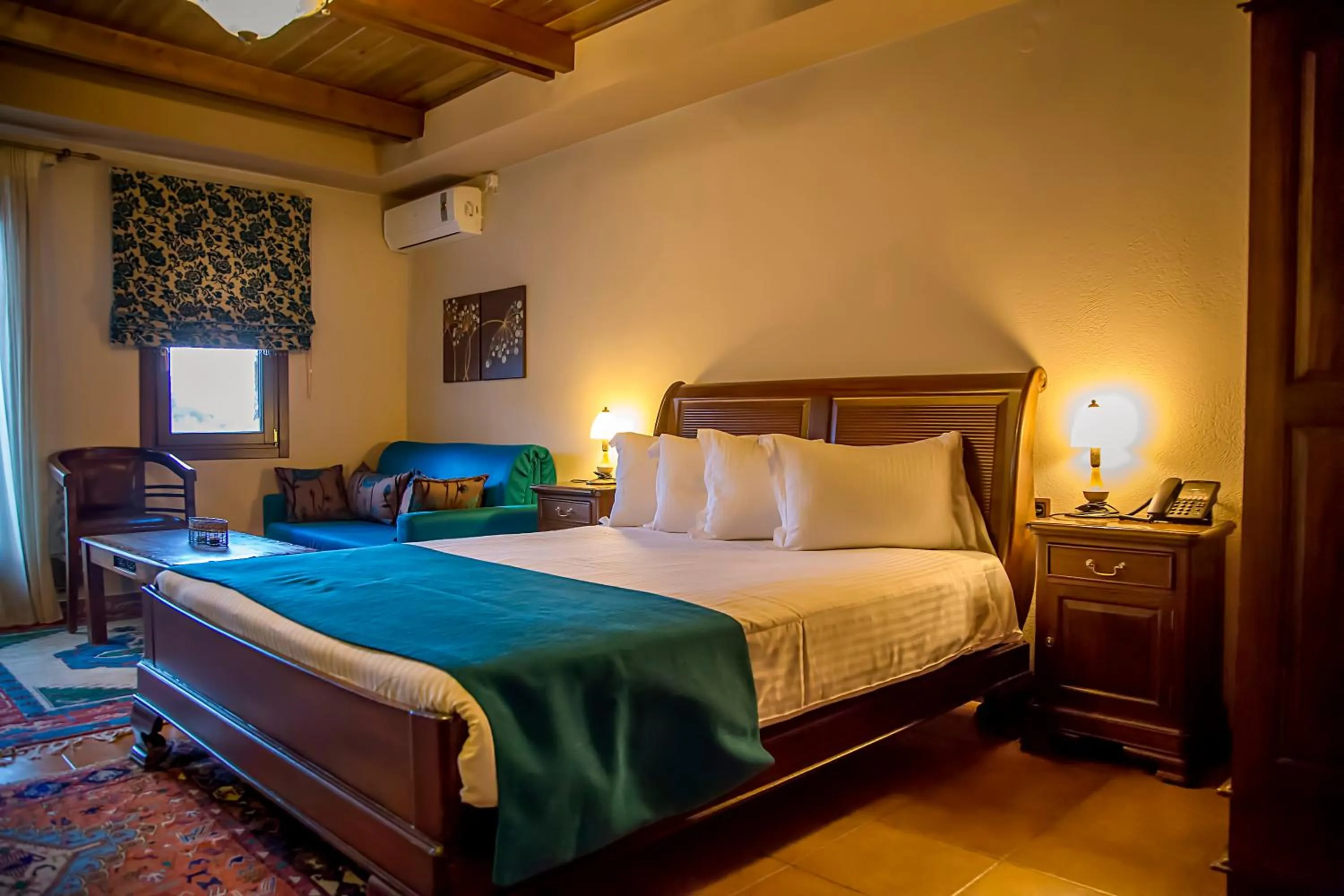 Seating area, Bed in Pandion Luxury Boutique Hotel & Suites with Spa