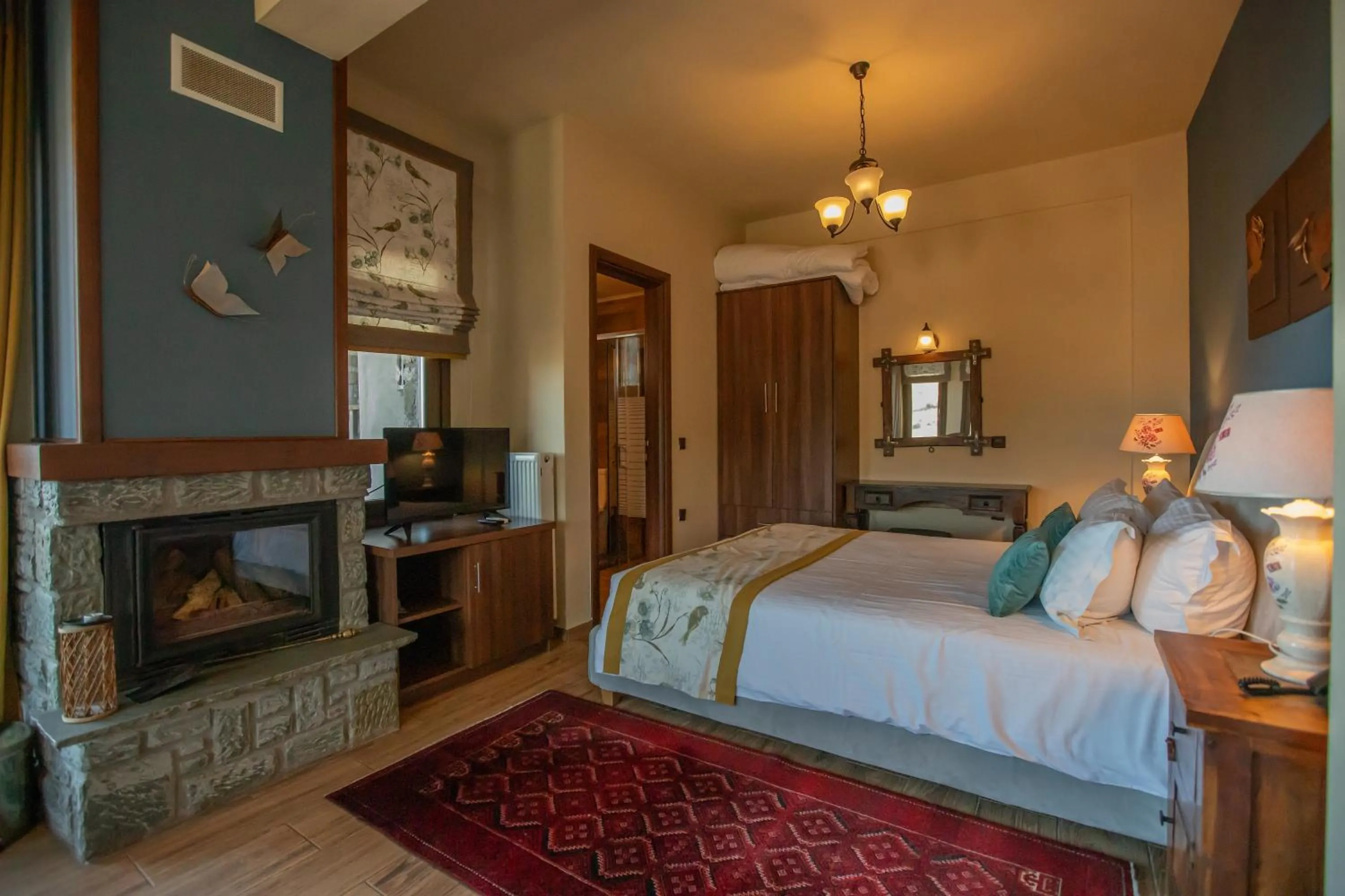 Bed in Pandion Luxury Boutique Hotel & Suites with Spa