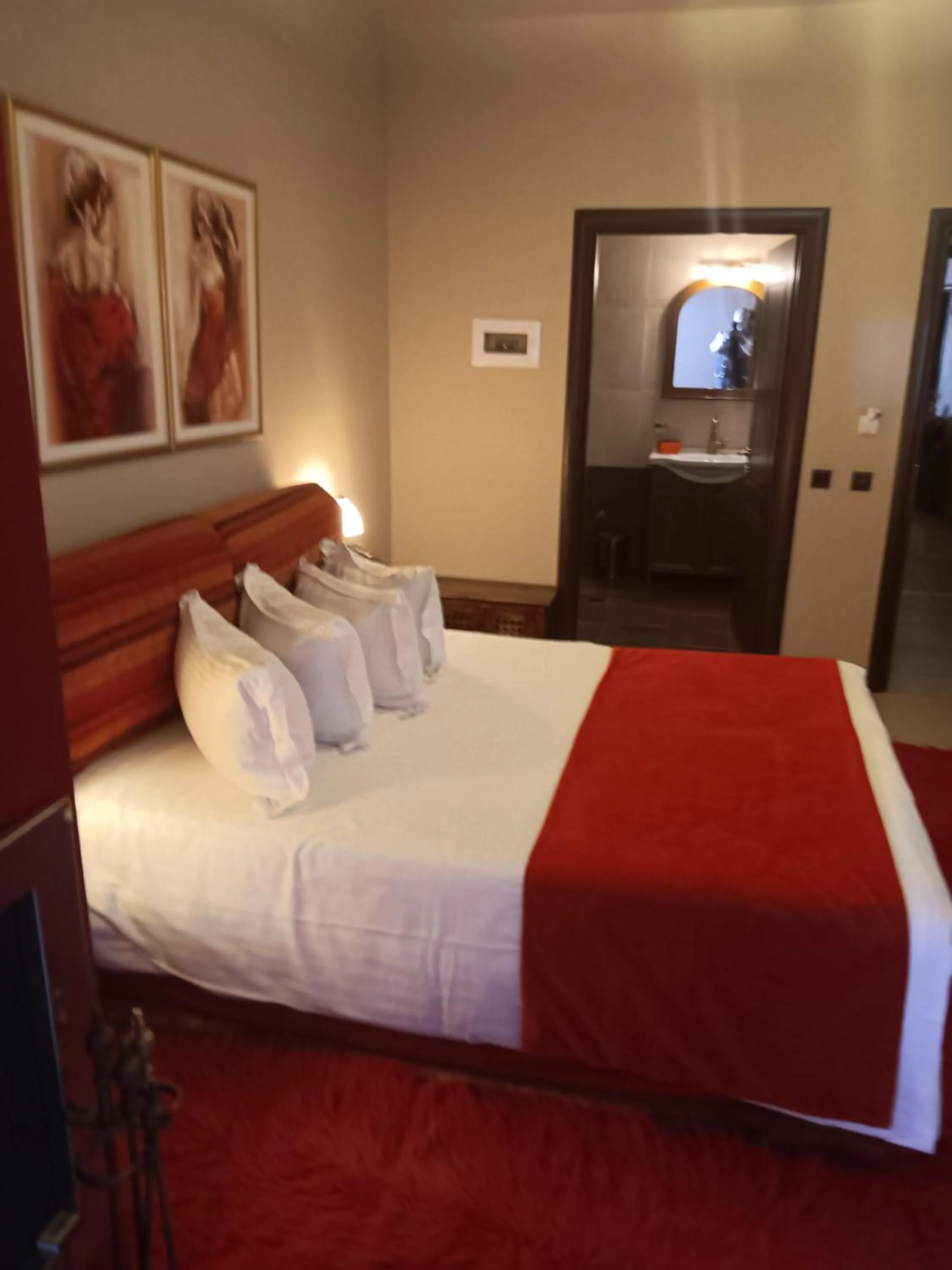 Bed in Pandion Luxury Boutique Hotel & Suites with Spa
