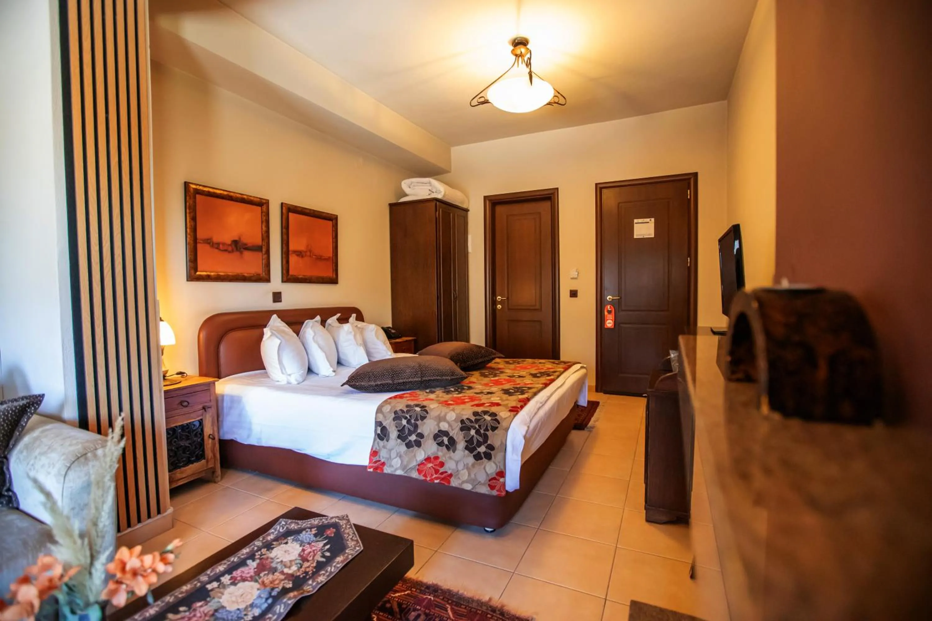 Bed in Pandion Luxury Boutique Hotel & Suites with Spa