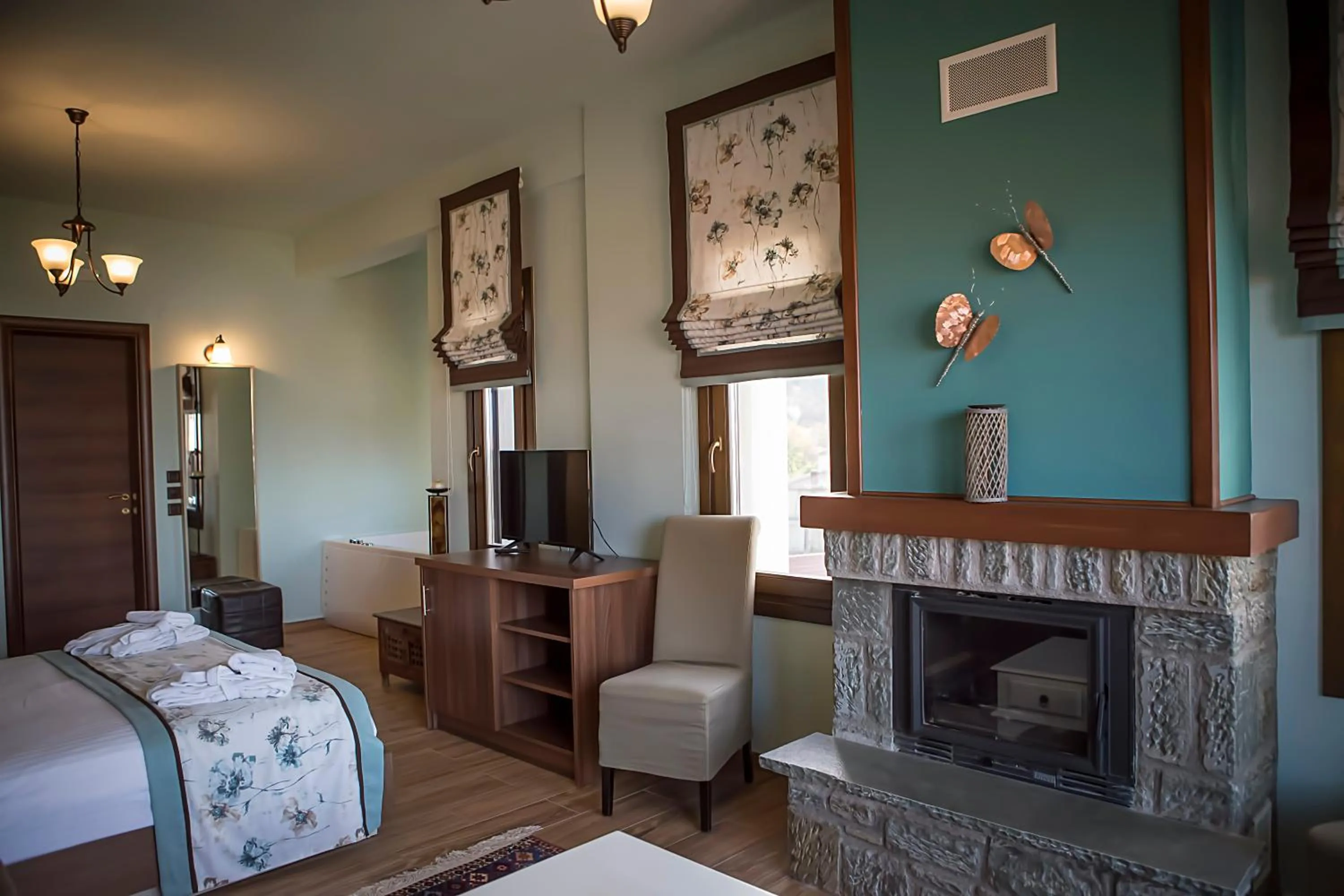 Bed in Pandion Luxury Boutique Hotel & Suites with Spa
